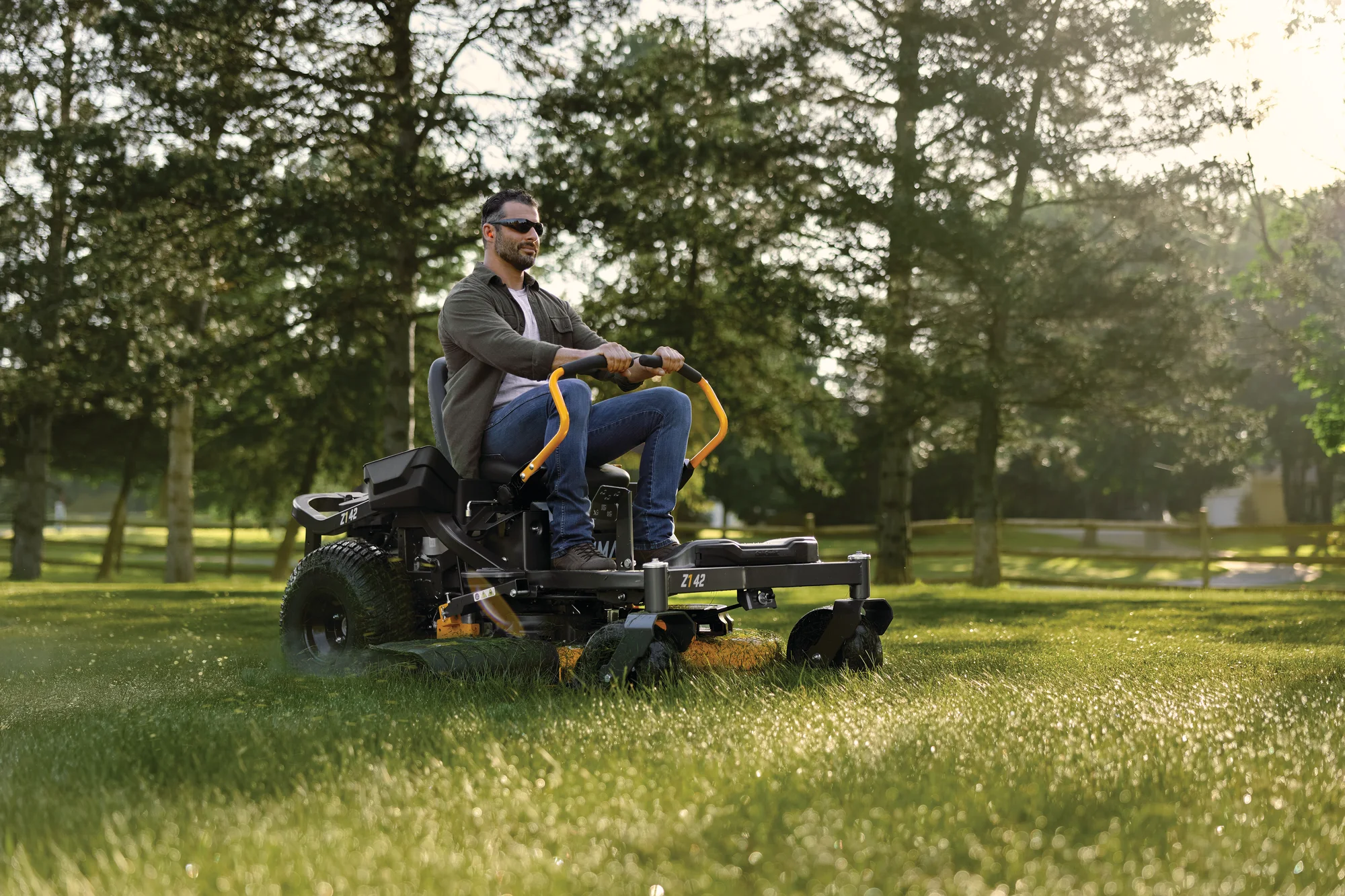 Cub Cadet Ultima Series Z Zero Turn Rider Z1 42 Ip Side View Man Cutting Grass product image