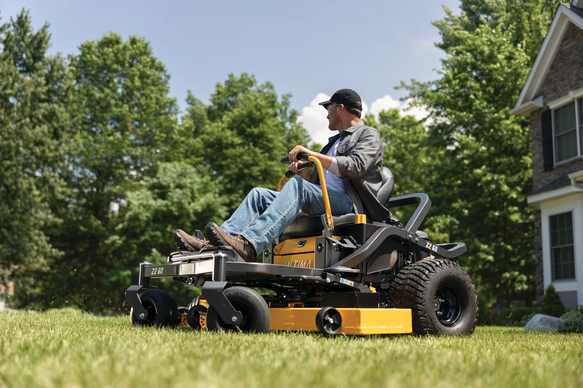 Cub Cadet Ultima Series Z Zero Turn Rider Z2 60 Side View Right Man Cutting Lawn product image