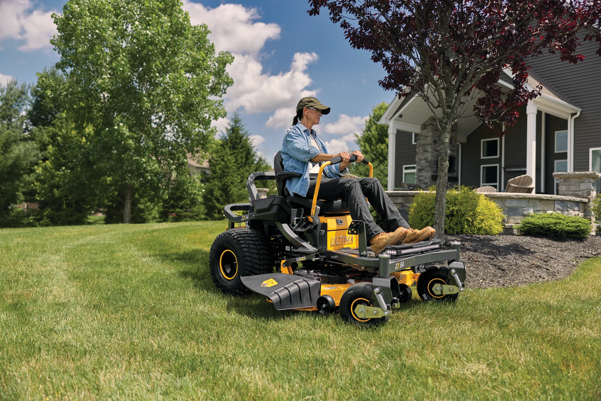 Cub Cadet Ultima Series Z Zero Turn Rider Z3 54 Front View Left Woman Cutting Grass product image