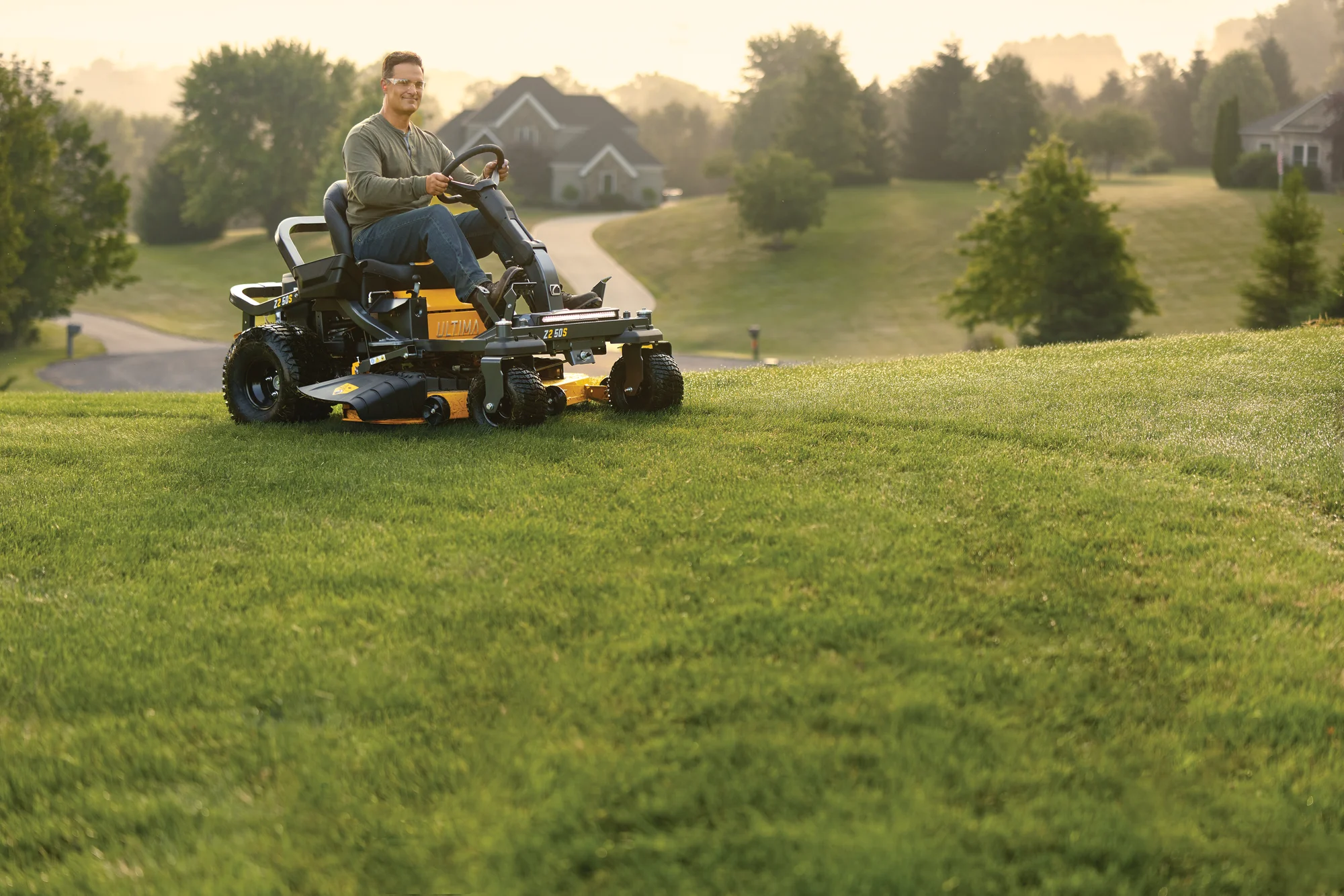 Cub Cadet Ultima Series Zs Zero Turn Rider Z2 50S Front View Left Man Cutting Lawn product image