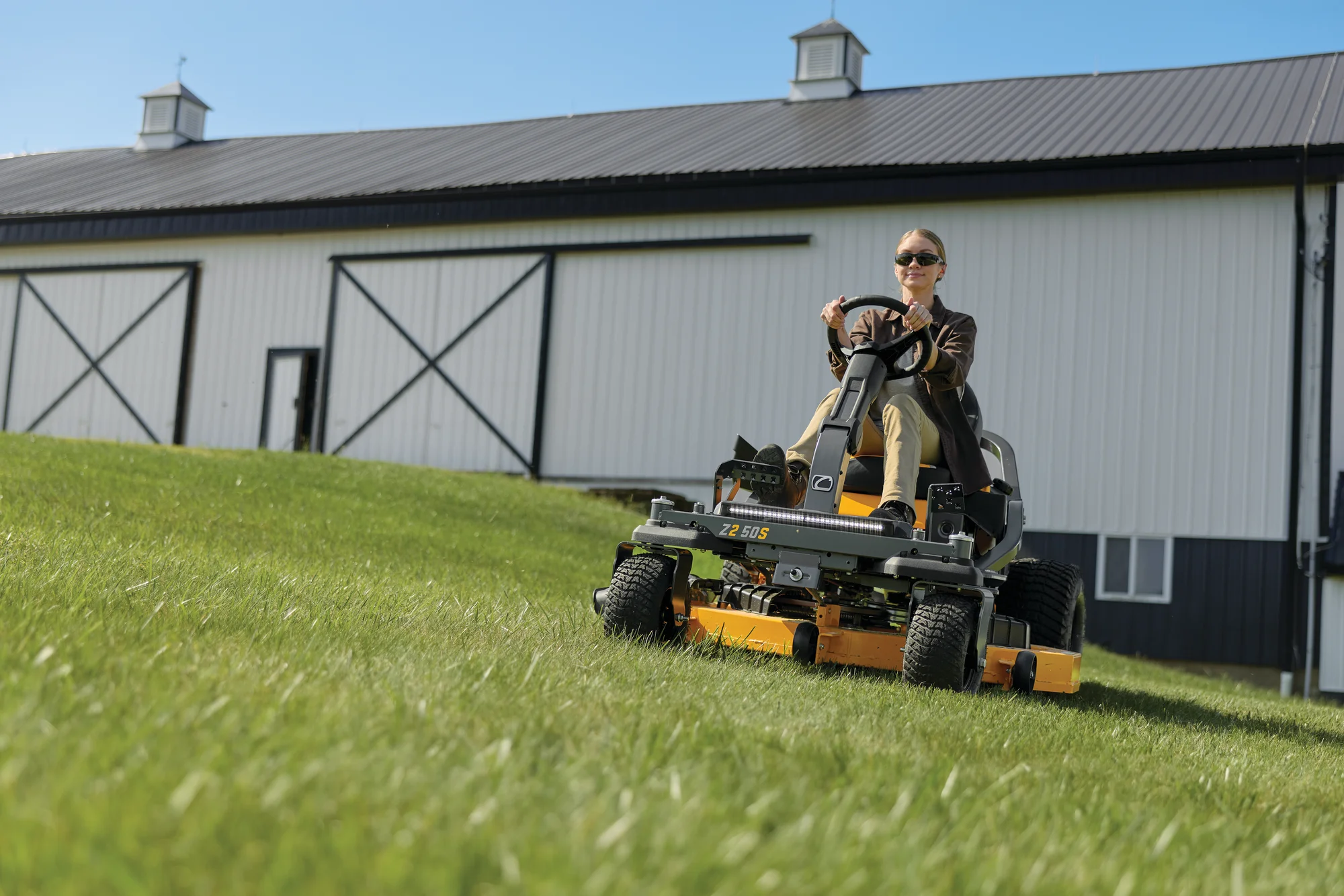 Cub Cadet Ultima Series Zs Zero Turn Rider Z2 50S Front View Right Woman Cutting Grass product image