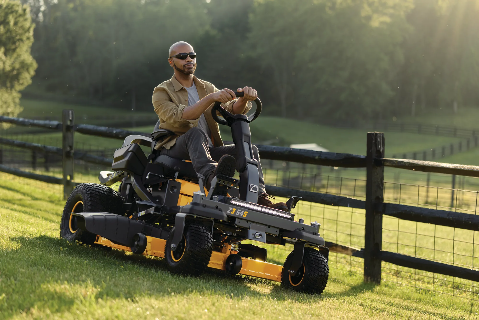 Cub Cadet Ultima Series ZS Zero Turn Rider Z3 54S Cub Cadet Ultima Series Zs Zero Turn Rider Z3 54S Front View Left Closeup Man Cutting Lawn product image