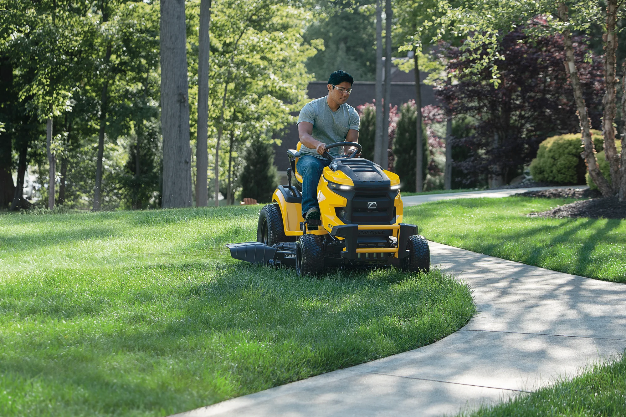 Cub Cadet Xt2 Enduro Series Lawn Tractor Xt2 Slx50 Man Mowing Lawn product image