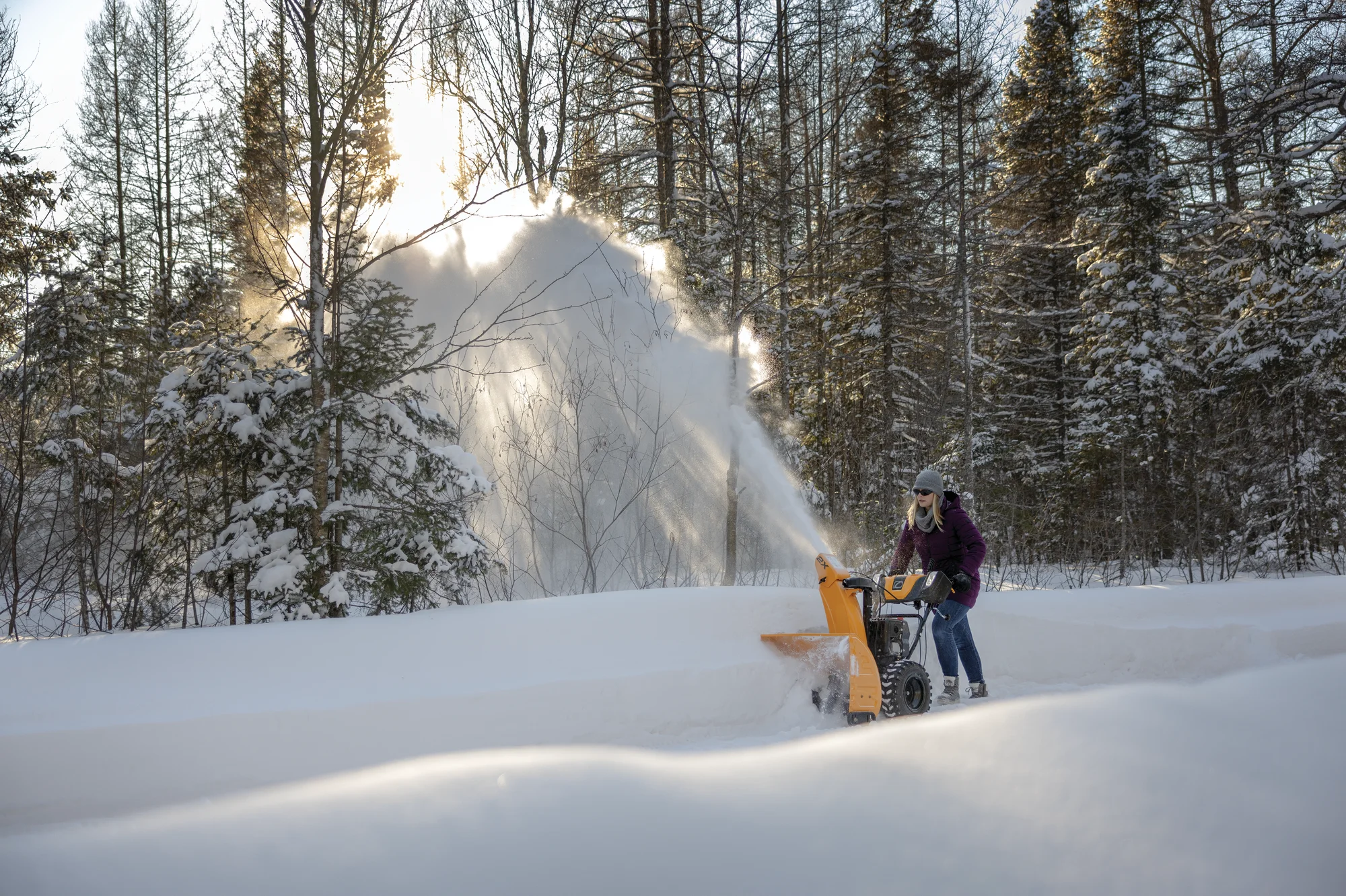 Cub Cadet Two Stage INTELLIPOWER Snow Blower 2X 28 HP Cubcadet 2X Series Two Stage Snow Blower 2X28 Egov Woman Clearing Driveaway Forest Side View product image