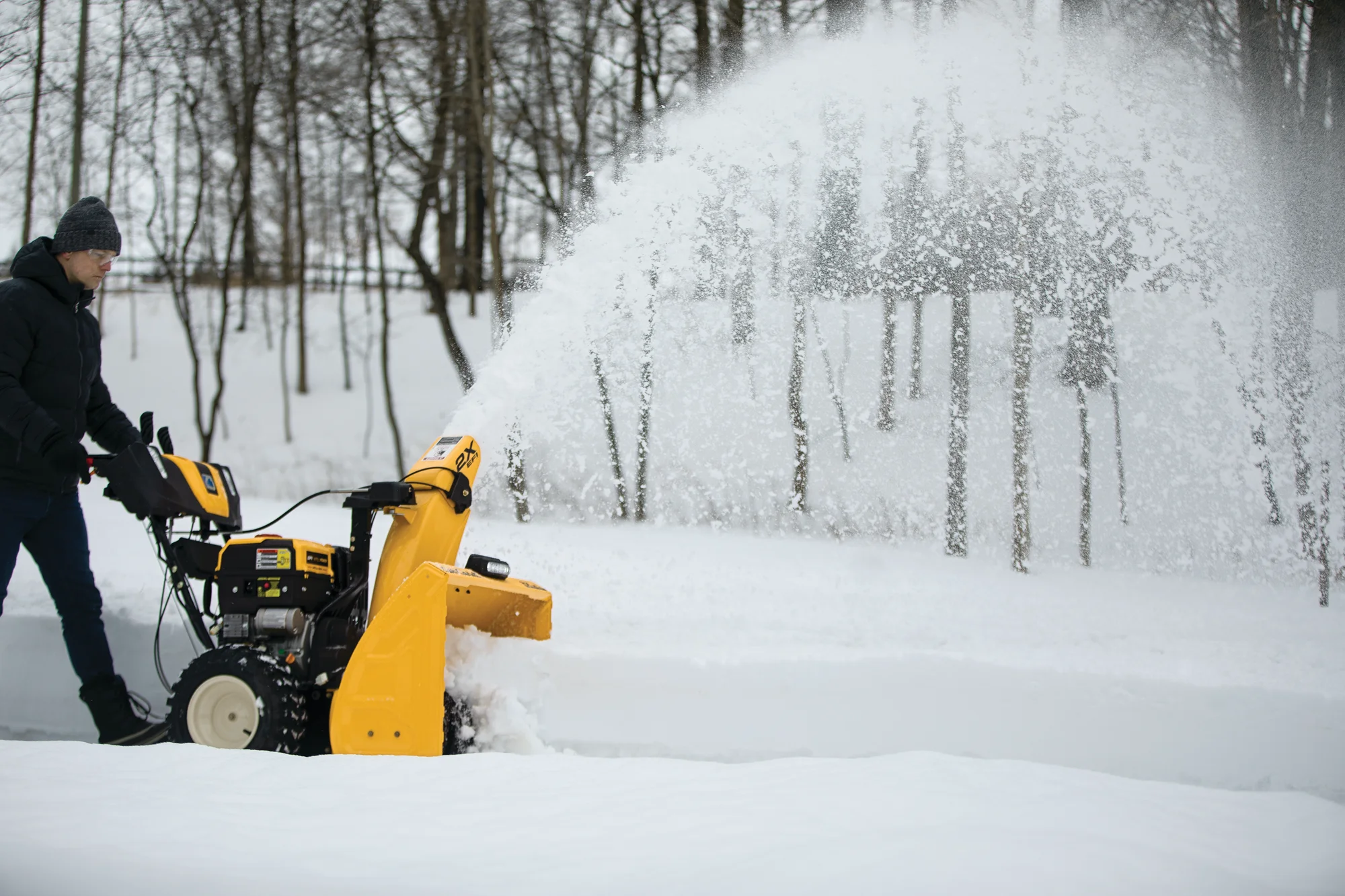 Cubcadet 2X Series Two Stage Snow Blower 2X30 Efi Egov Man Clearing Driveaway Side View product image