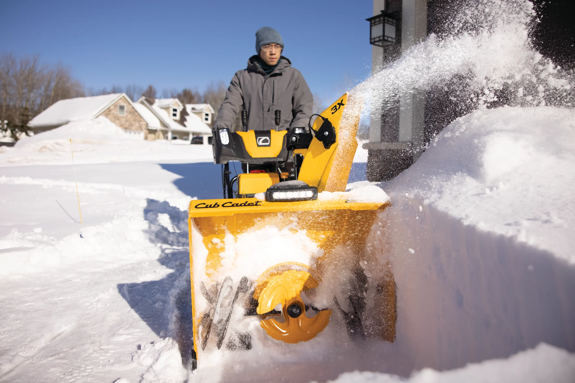 Cubcadet 3X Series Three Stage Snow Blower 3X30 Hd Egov Man Clearing Driveway Front View product image