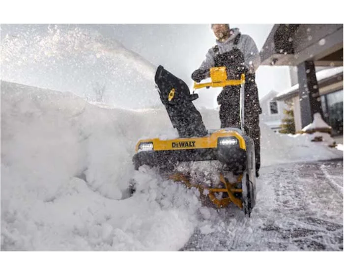 DeWalt Single Stage 60V MAX Snow Blower Kit DCSNP2142Y2 Dewalt 60V Max Series Single Stage Snow Blower Dcsnp2142Y2 Throwing Snow Closeup product image