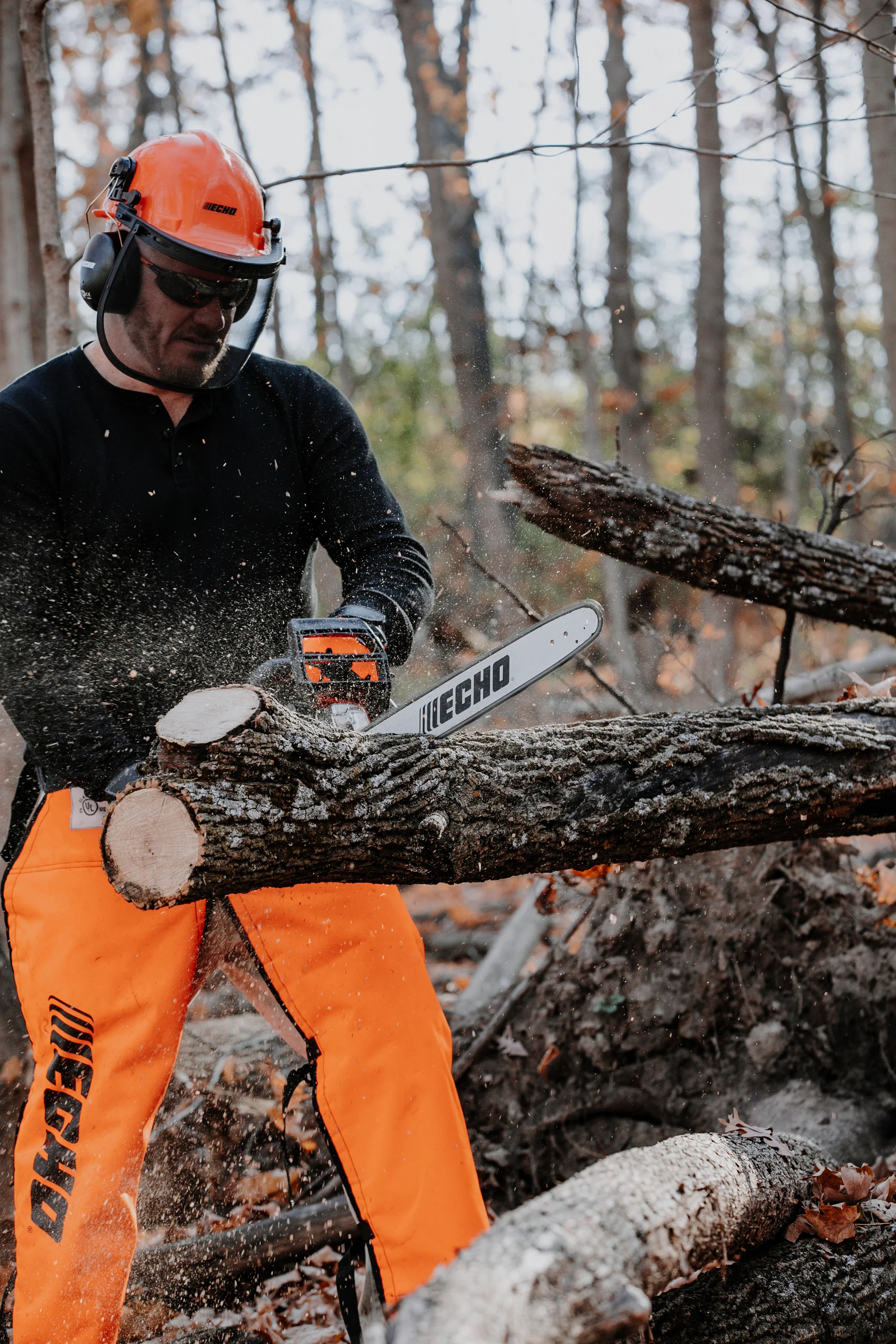 Echo Chainsaw CS-3410 16 Echo Chainsaw Cs 3410 16 Man Cutting Branch Front View product image