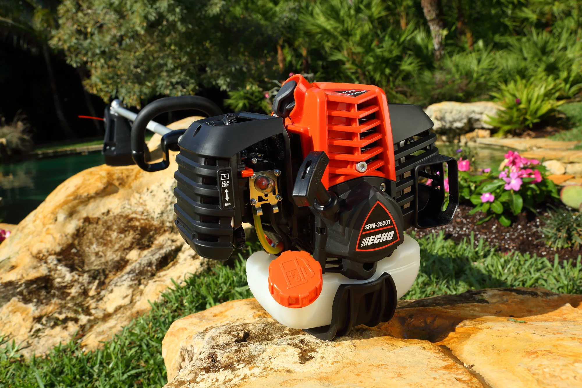 Echo Srm Series Trimmer Srm 2620 Trimmer Next To Flower Bed product image