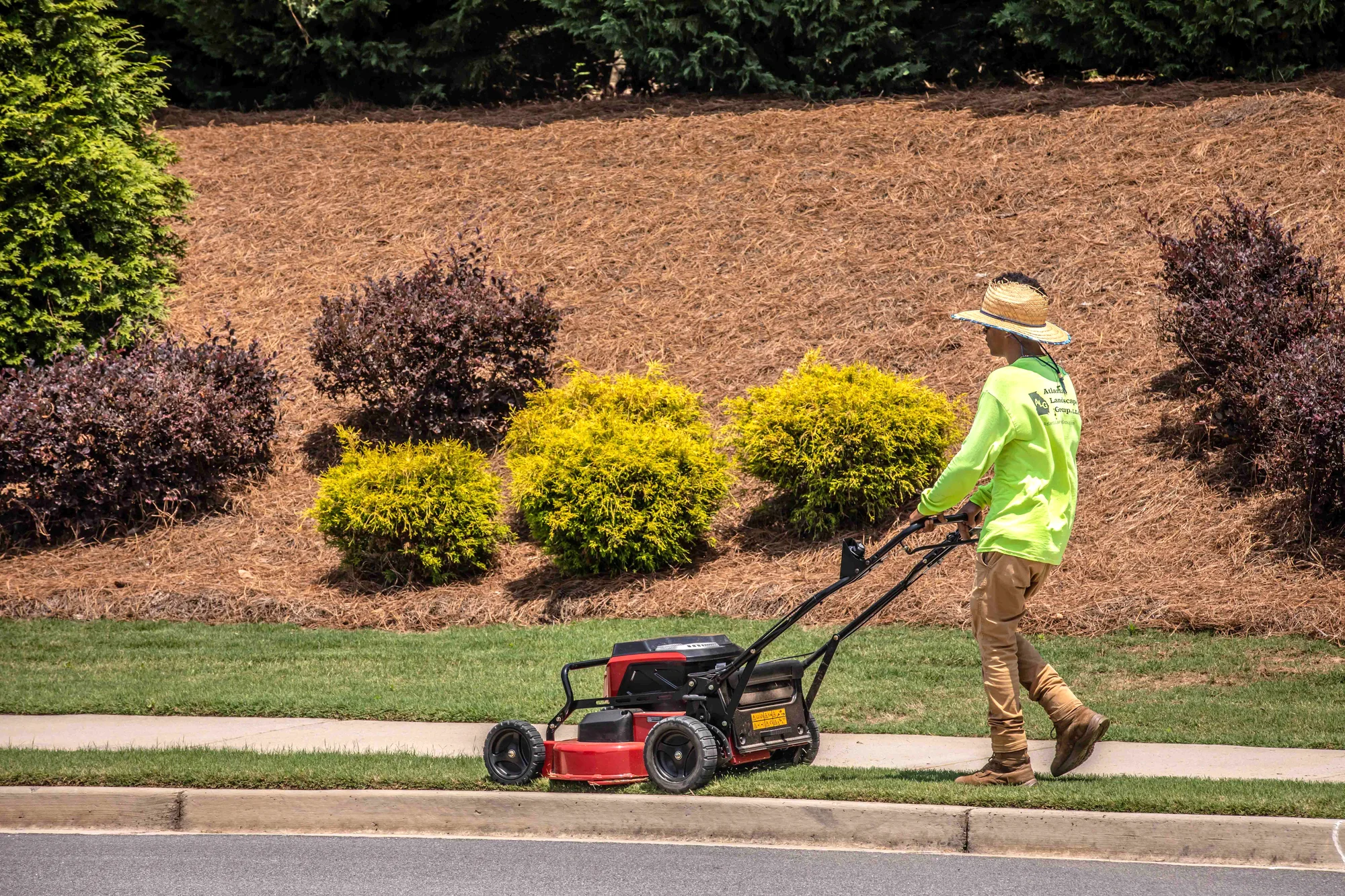 Exmark Commercial 30 V Series Walk Behind Lawn Mower Ecv060B0230010 Mowing Sidewalk Edge By Pine Straw Beds product image