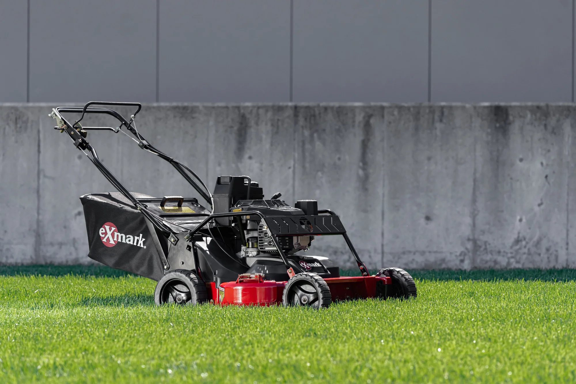Exmark Commercial 30 X Series Walk Behind Lawn Mower ECX200GKC300CS Exmark Commercial 30 X Series Walk Behind Lawn Mower Ecx200Gkc300Cs Front View Left On Lawn product image