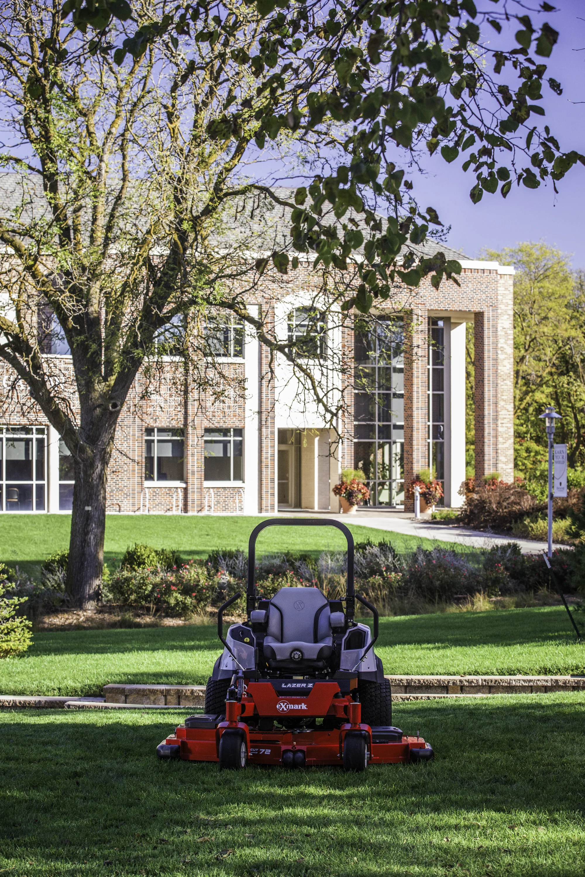 Exmark Lazer Z S Diesel Series Zero Turn Rider LZS80TDYM724W0 Exmark Lazer Z S Diesel Series Zero Turn Rider Lzs80Tdym724W0 Mwer On Property Front View product image