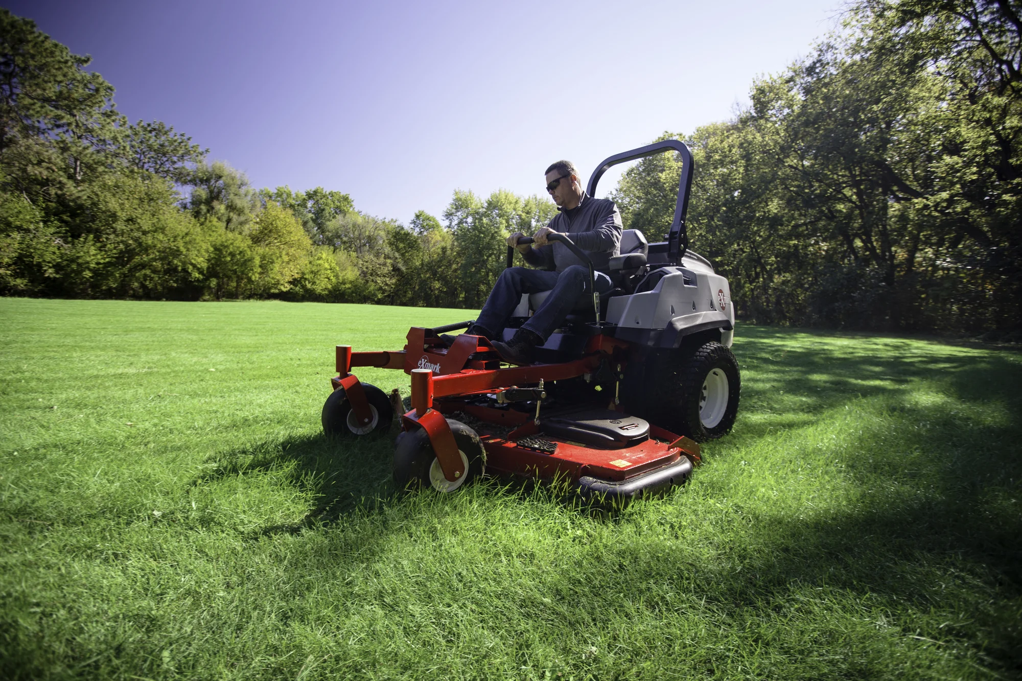 Exmark Lazer Z S Diesel Series Zero Turn Rider LZS80TDYM72RW0 Exmark Lazer Z S Diesel Series Zero Turn Rider Lzs80Tdym72Rw0 Man On Mower Wide Angle product image