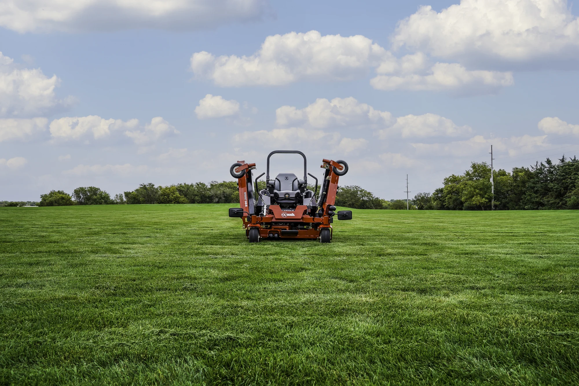 Exmark Lazer Z S Diesel Series Zero Turn Rider LZS86TDYM12RW0 Exmark Lazer Z S Diesel Series Zero Turn Rider Lzs86Tdym12Rw0 Distant View Mower On Grass product image