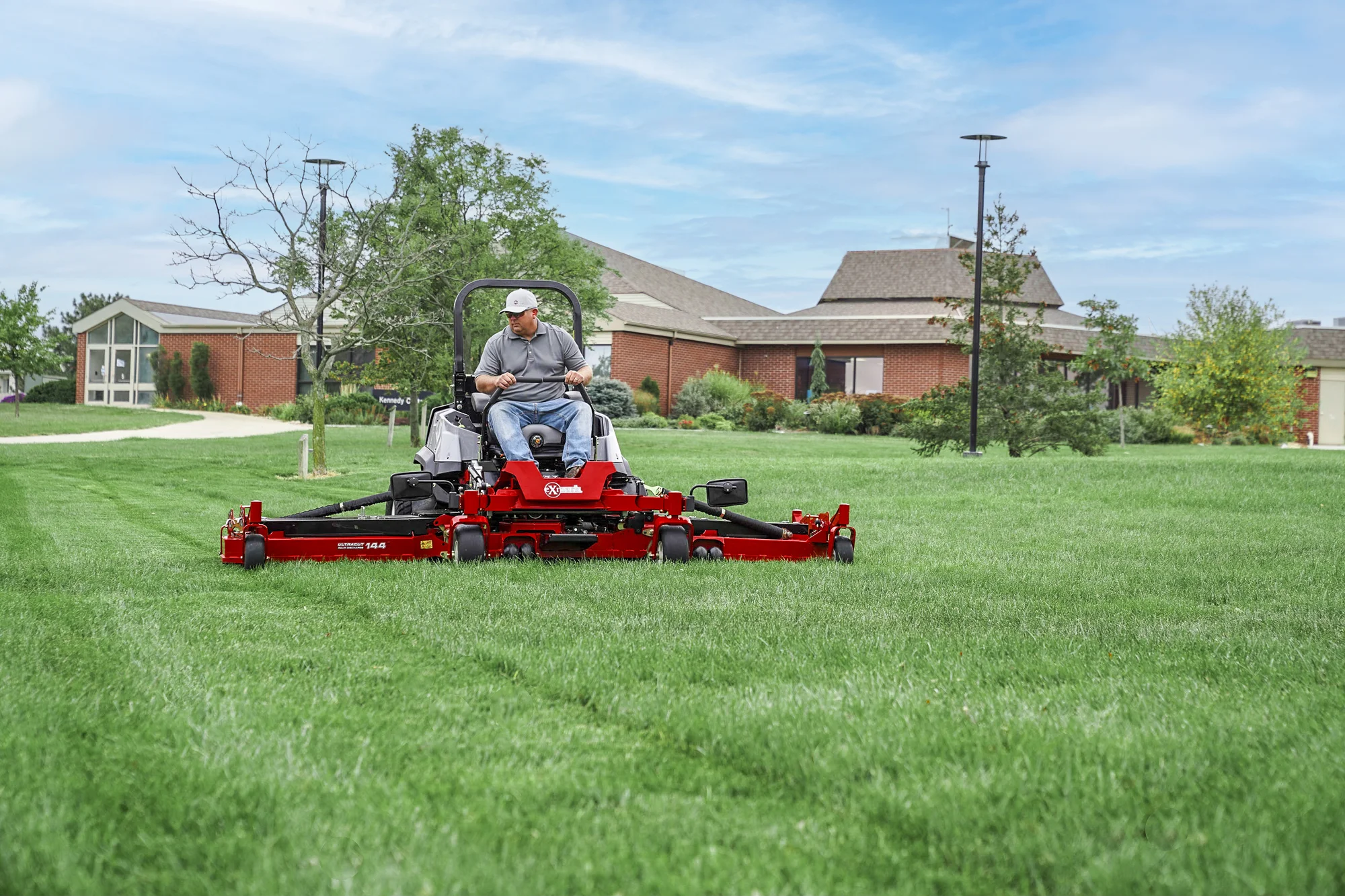 Exmark Lazer Z S Diesel Series Zero Turn Rider LZS86TDYM12RW0 Exmark Lazer Z S Diesel Series Zero Turn Rider Lzs86Tdym12Rw0 Man Mowing Property product image