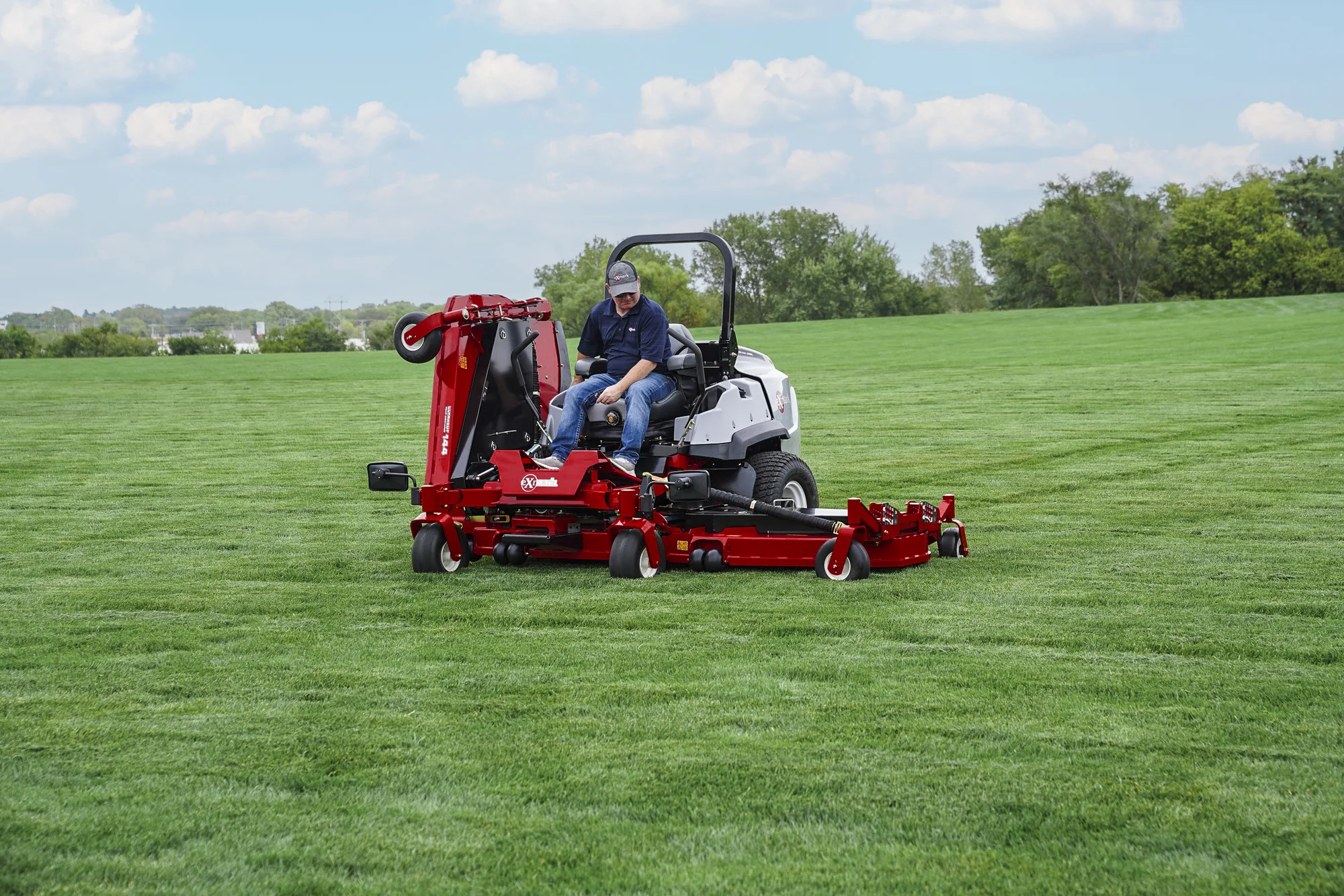 Exmark Lazer Z S Diesel Series Zero Turn Rider Lzs86Tdym12Rw0 Man Posing Mower product image