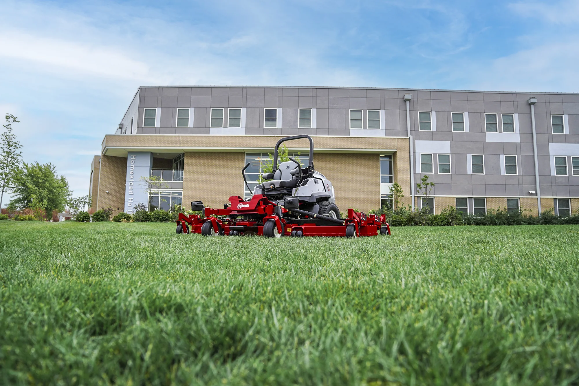 Exmark Lazer Z S Diesel Series Zero Turn Rider Lzs86Tdym12Rw0 Side View Mower On Lawn product image