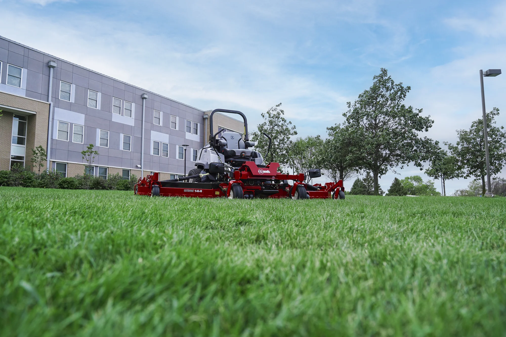 Exmark Lazer Z S Diesel Series Zero Turn Rider Lzs86Tdym12Rw0 Wide Angle Mower On Lawn product image