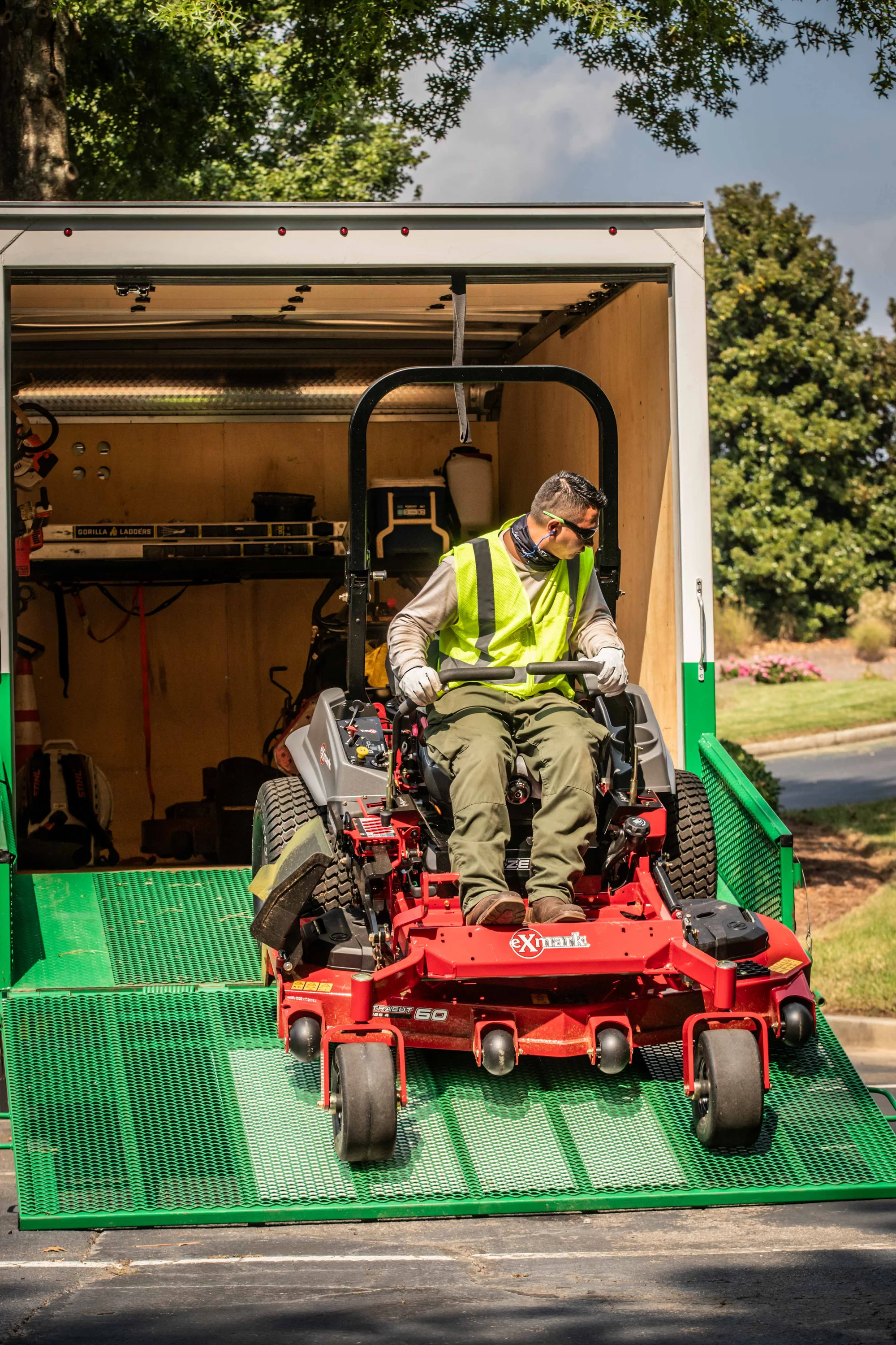Exmark Lazer Z S Series Zero Turn Rider LRS749AKC524A2 Exmark Lazer Z S Series Zero Turn Rider Lrs749Akc524A2 Man Uploading Mower Truck product image
