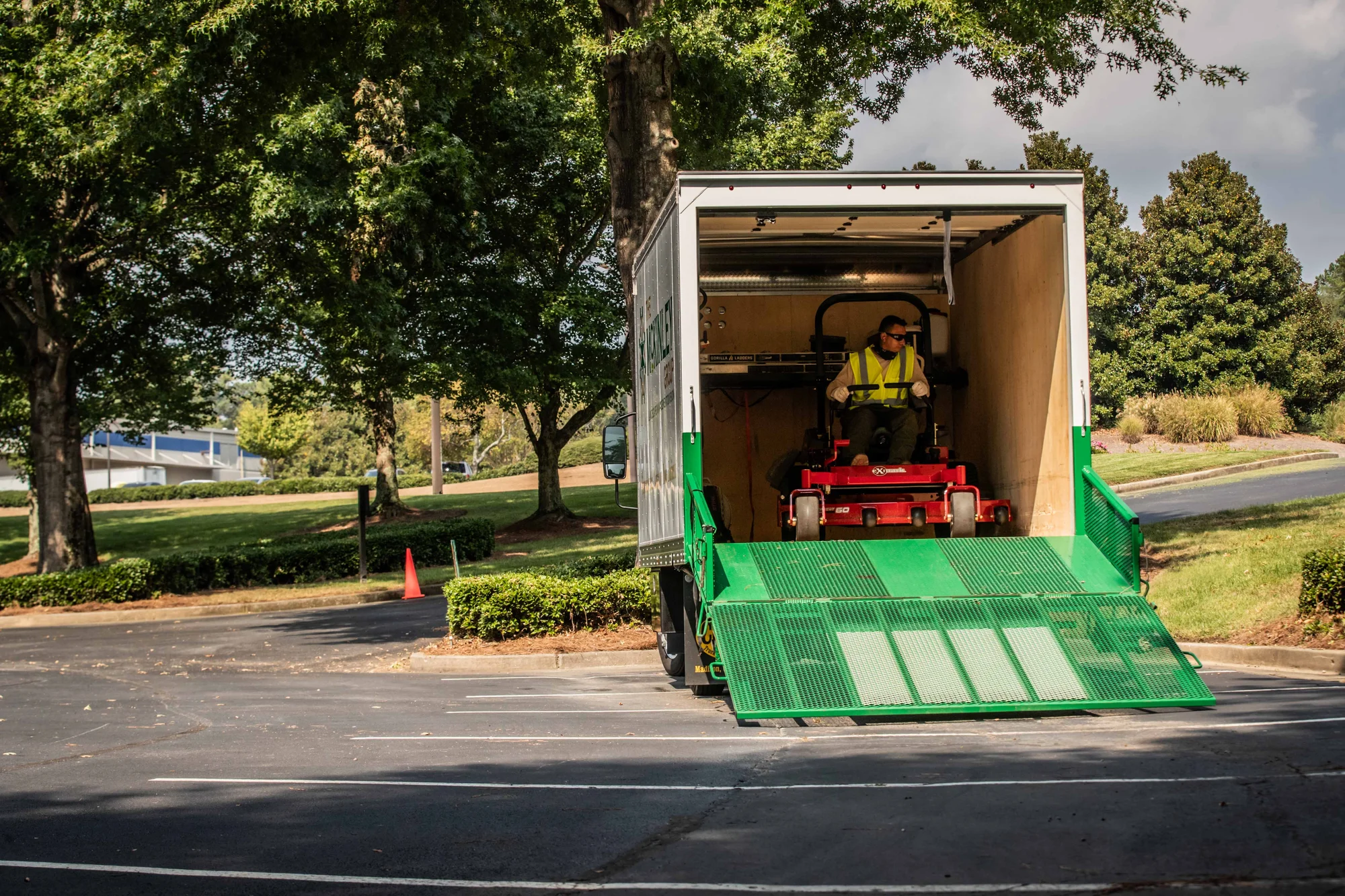 Exmark Lazer Z S Series Zero Turn Rider Lrs749Akc724A1 Man On Mower In Truck product image