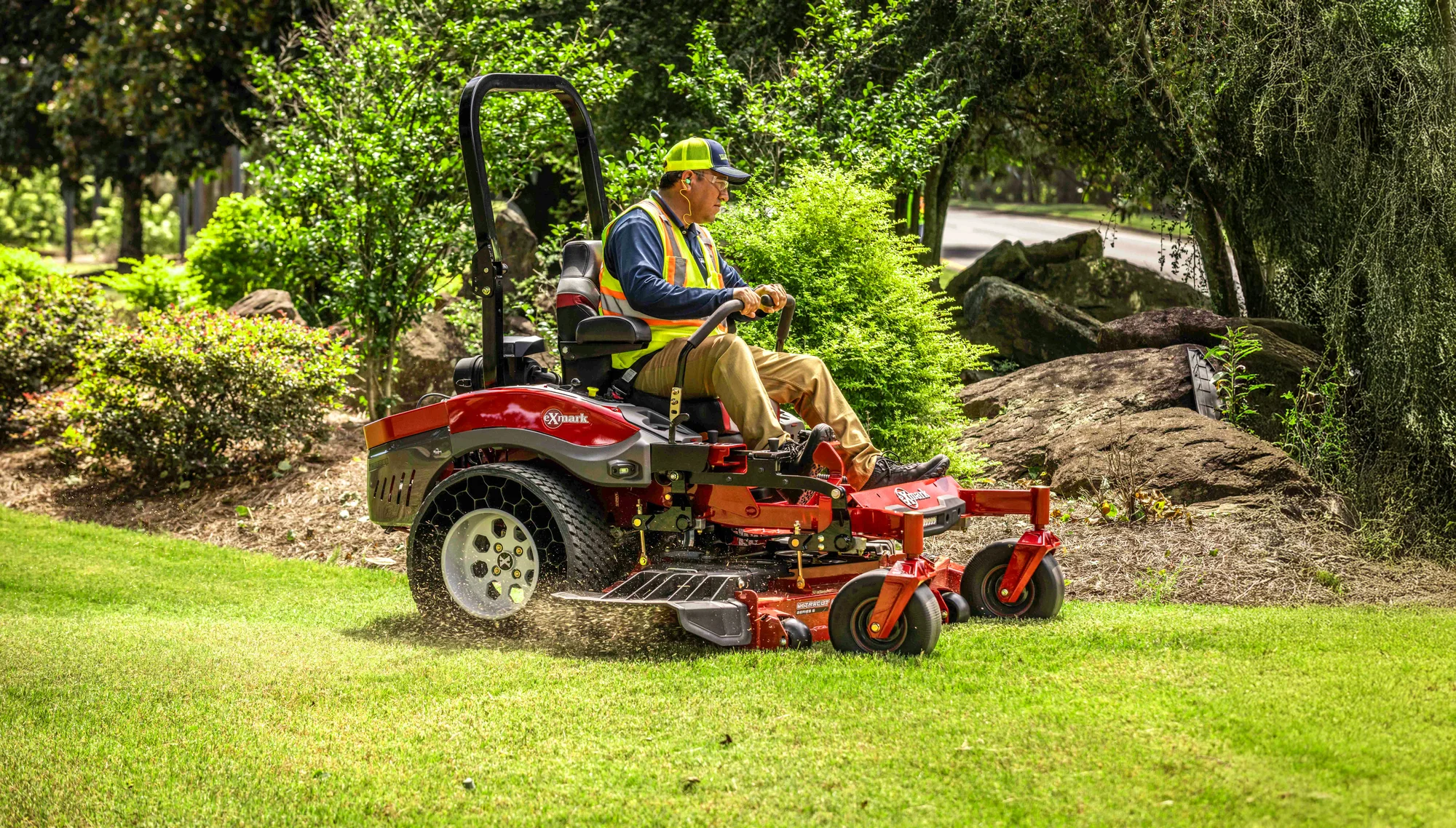 Exmark Lazer Z X Series Zero Turn Rider Lrx820Aka606Q1 Mower In Use Side View product image