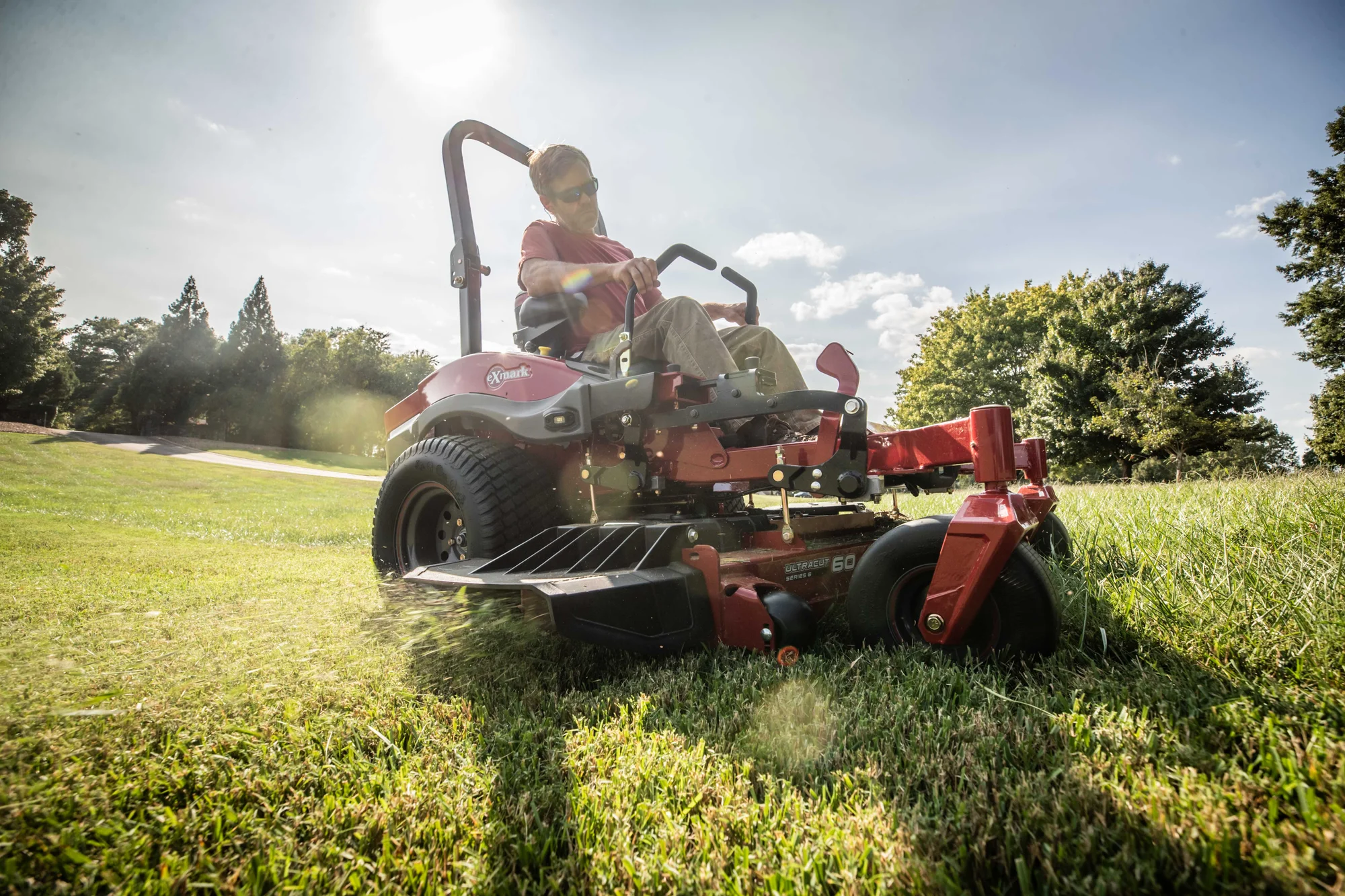 Exmark Lazer Z X Series Zero Turn Rider Lrx850Gka526Q1 Man Mower Sunset Wide Angle product image