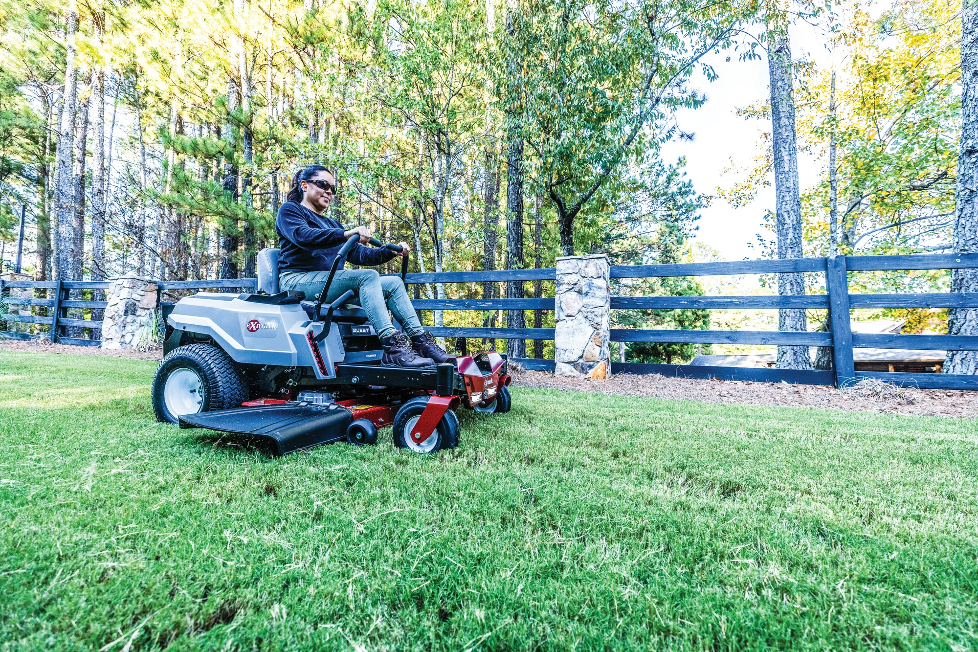 Exmark Quest V Series Zero Turn Rider QZV060B0242H00 Exmark Quest V Series Zero Turn Rider Qzv060B0242H00 Woman On Mower product image