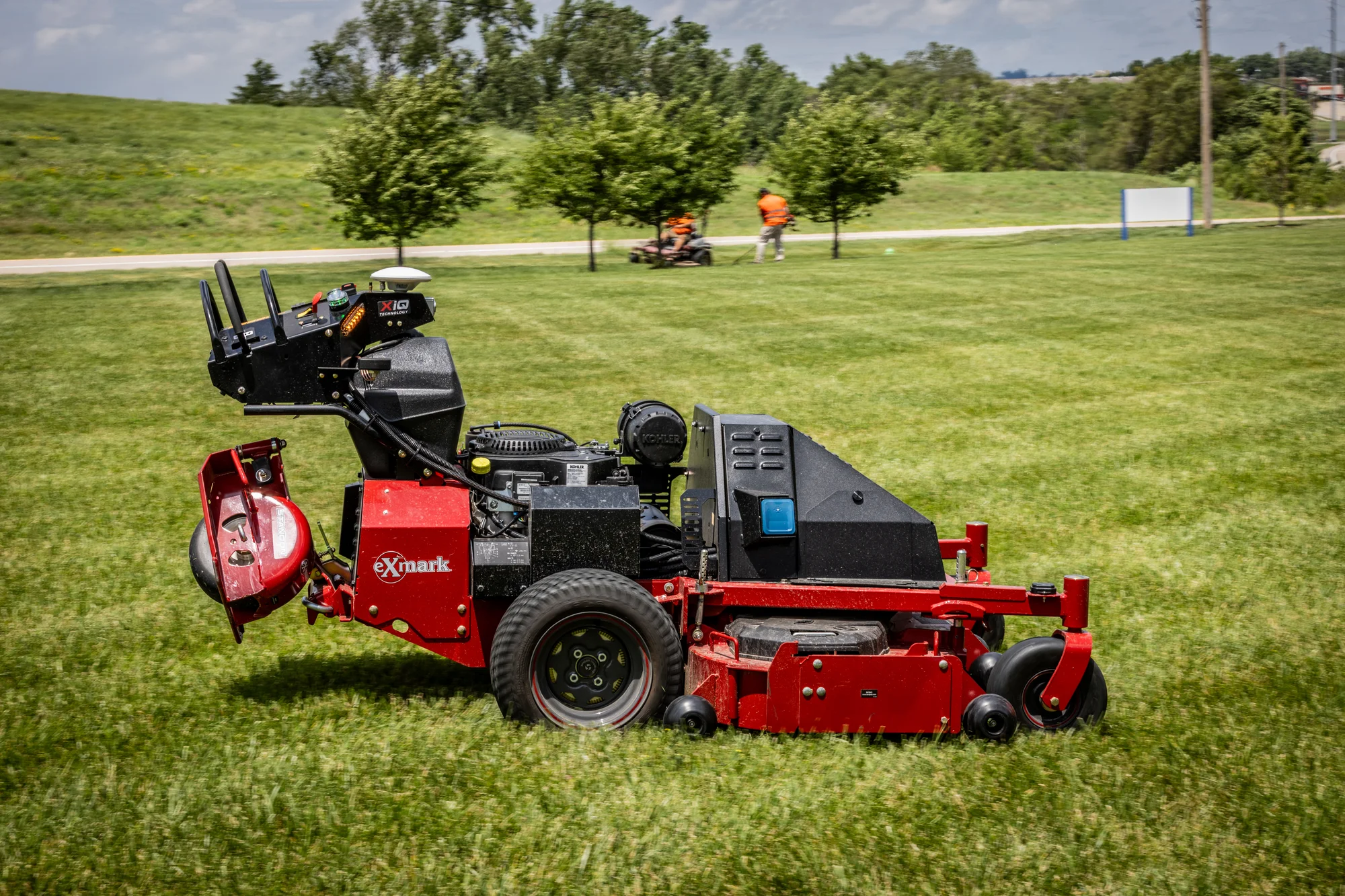 Exmark Turf Tracer Autonomous Series Walk Behind Lawn Mower Tta749Akc604N0 Mower Grass Closeup product image