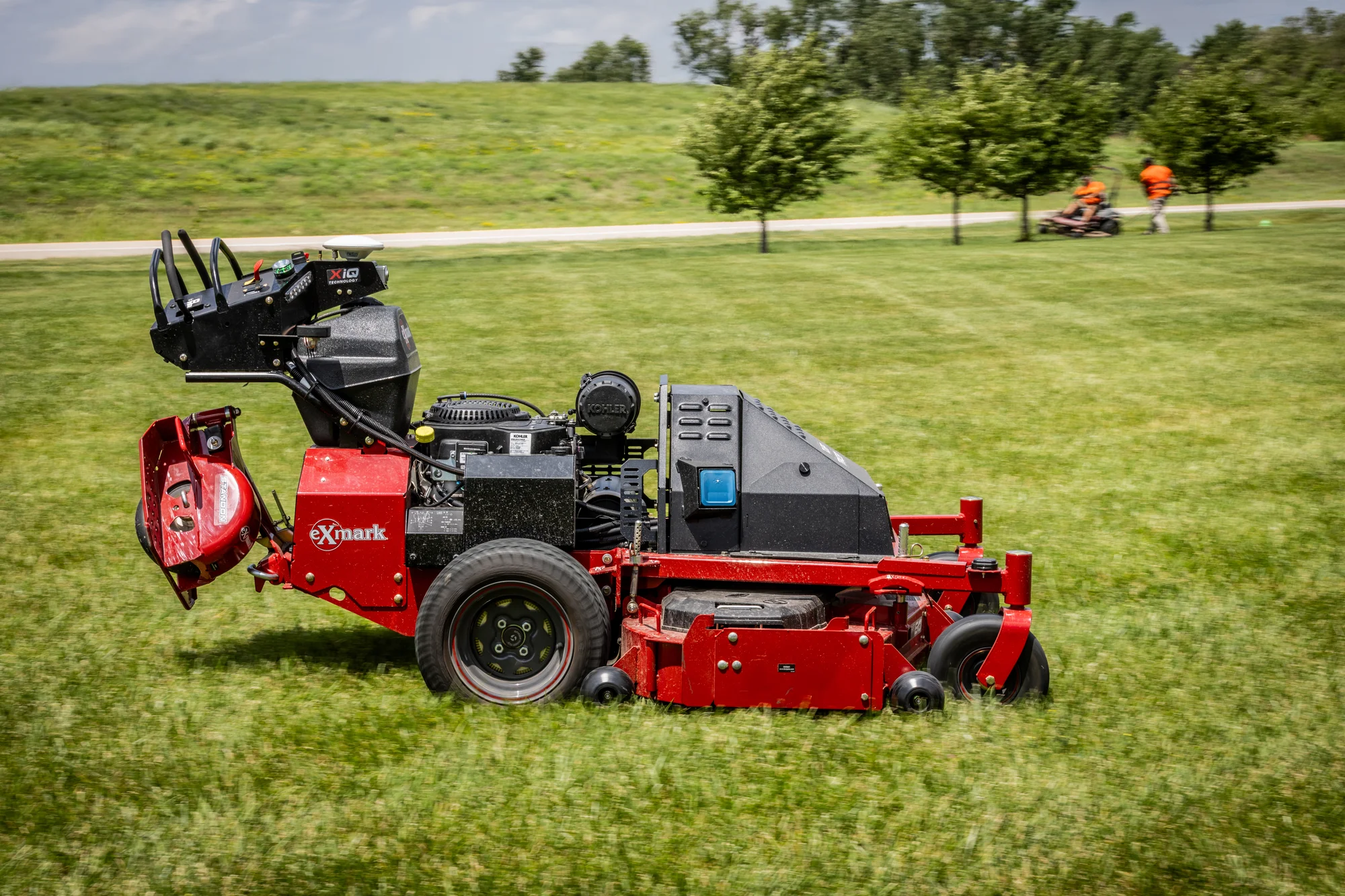 Exmark Turf Tracer Autonomous Series Walk Behind Mowers Commercial Floating Deck Heritage feature image