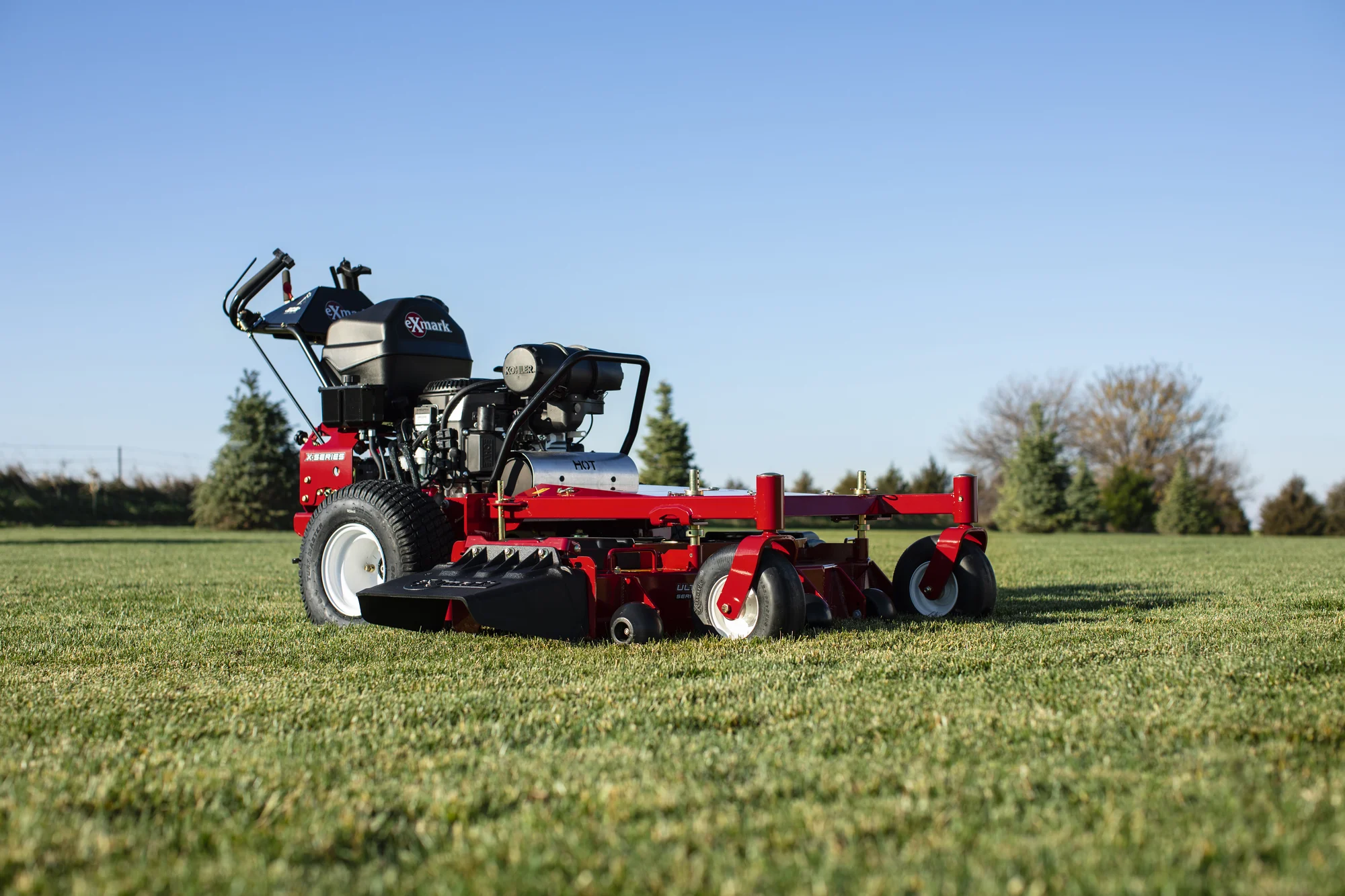 Exmark Turf Tracer X Series Lawn Mower Ttx691Gka60400 Mower On Grass Side View product image