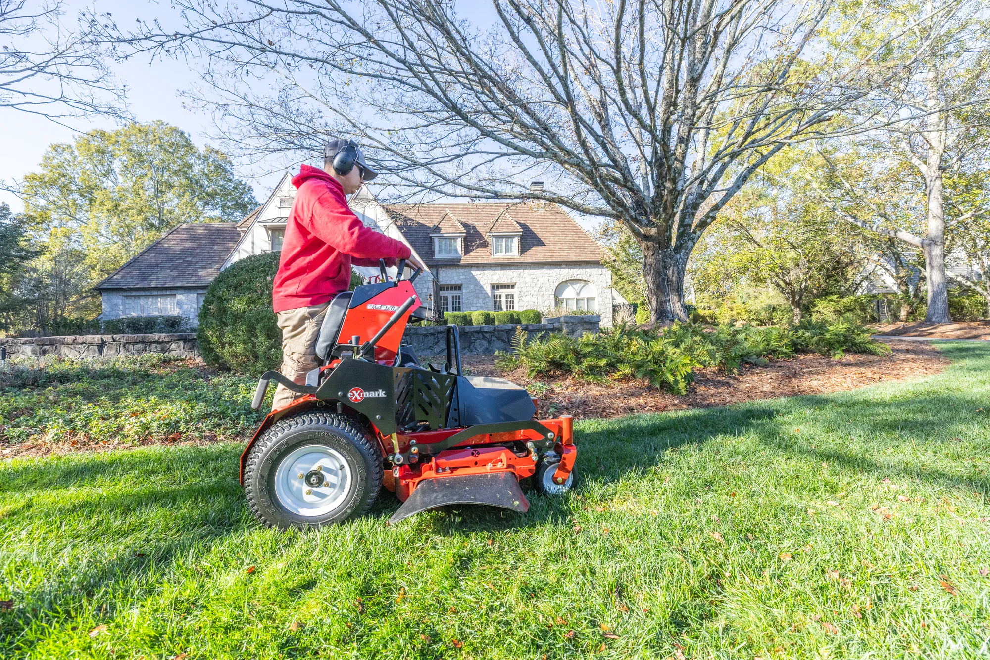 Exmark Vertex E Series Stand On Lawn Mower Vxe600Gka32300 Man Standing Tree House product image