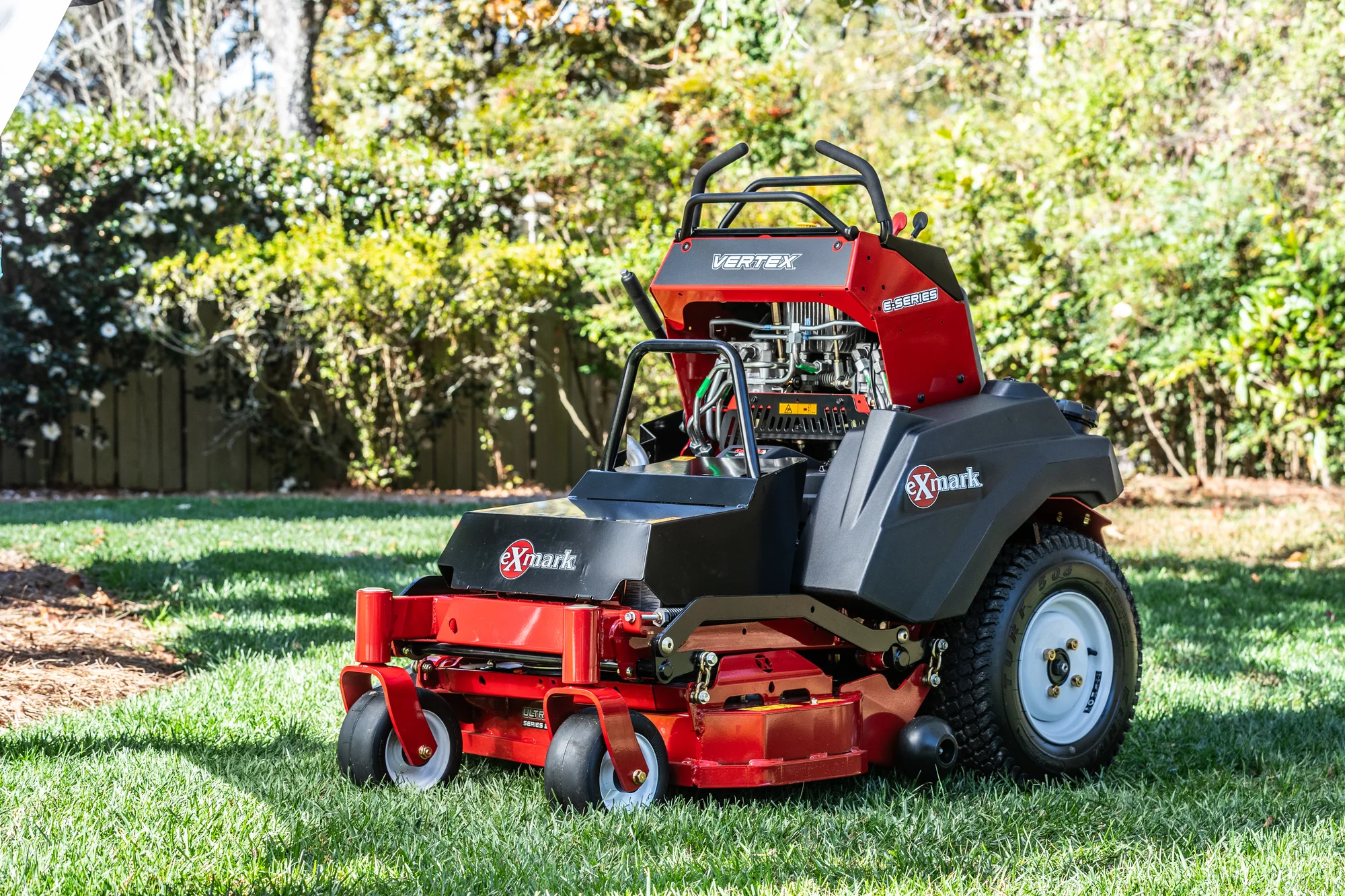 Exmark Vertex E Series Stand-On Lawn Mower VXE600GKA32300 Exmark Vertex E Series Stand On Lawn Mower Vxe600Gka32300 Side View Right Lawn Closeup product image