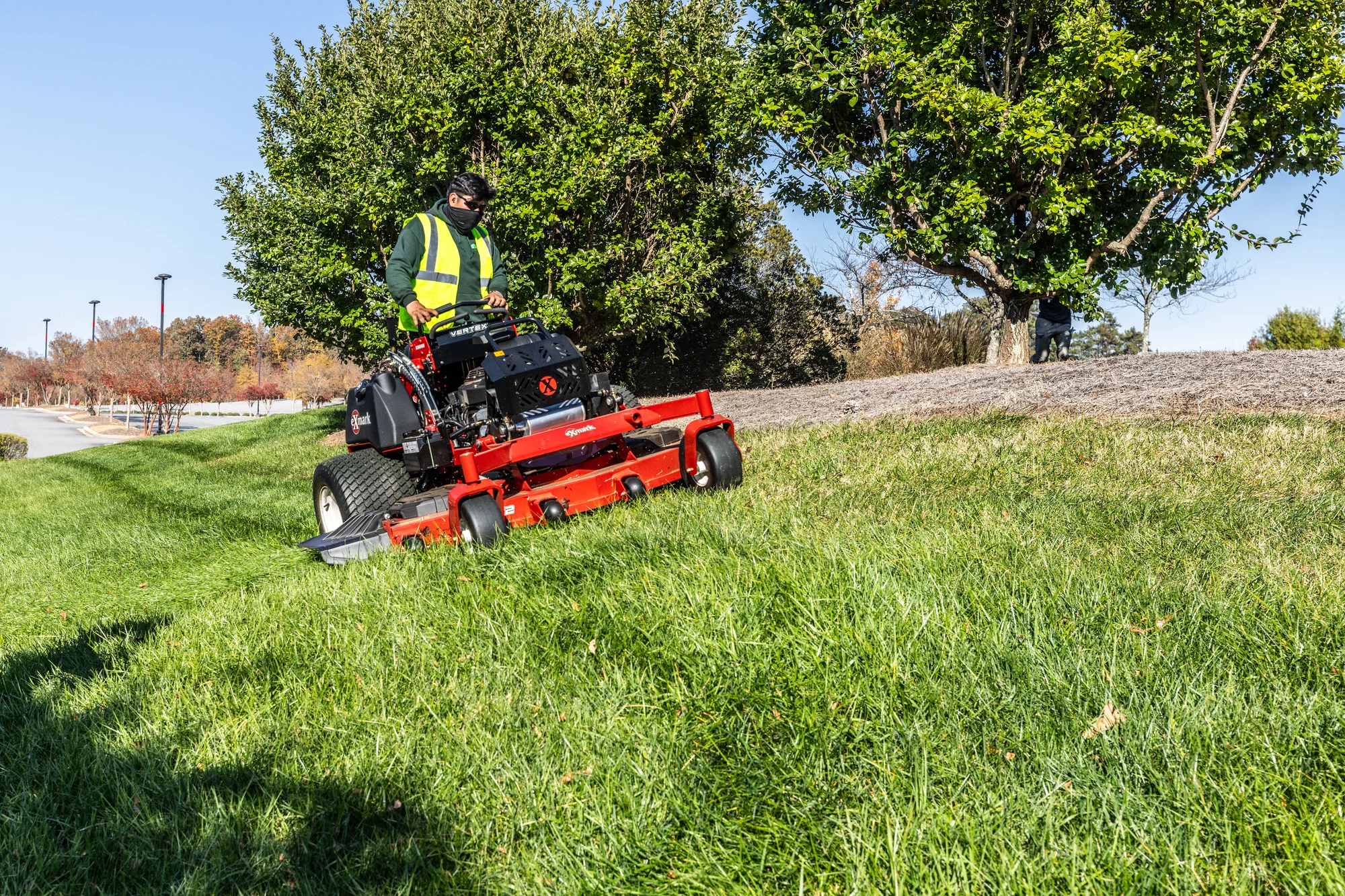 Exmark Vertex X Series Stand-On Lawn Mower VXX999EKA72600 Exmark Vertex X Series Stand On Lawn Mower Vxx999Eka72600 Man With Mask Striping Hill product image