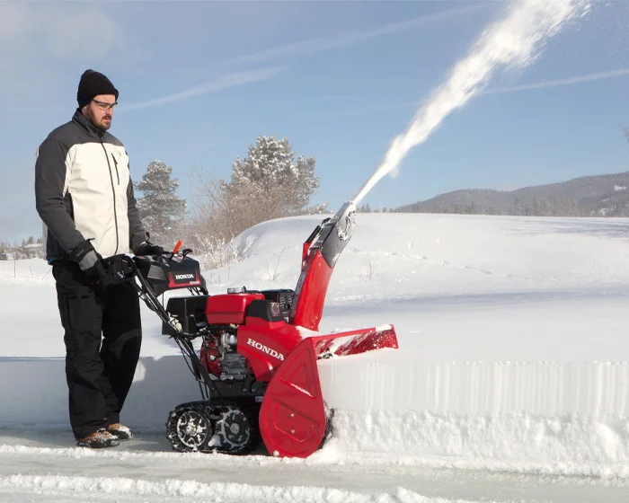 Honda Atd Series Two Stage Snow Blower Hss1332Atd Man Clearing Snow product image