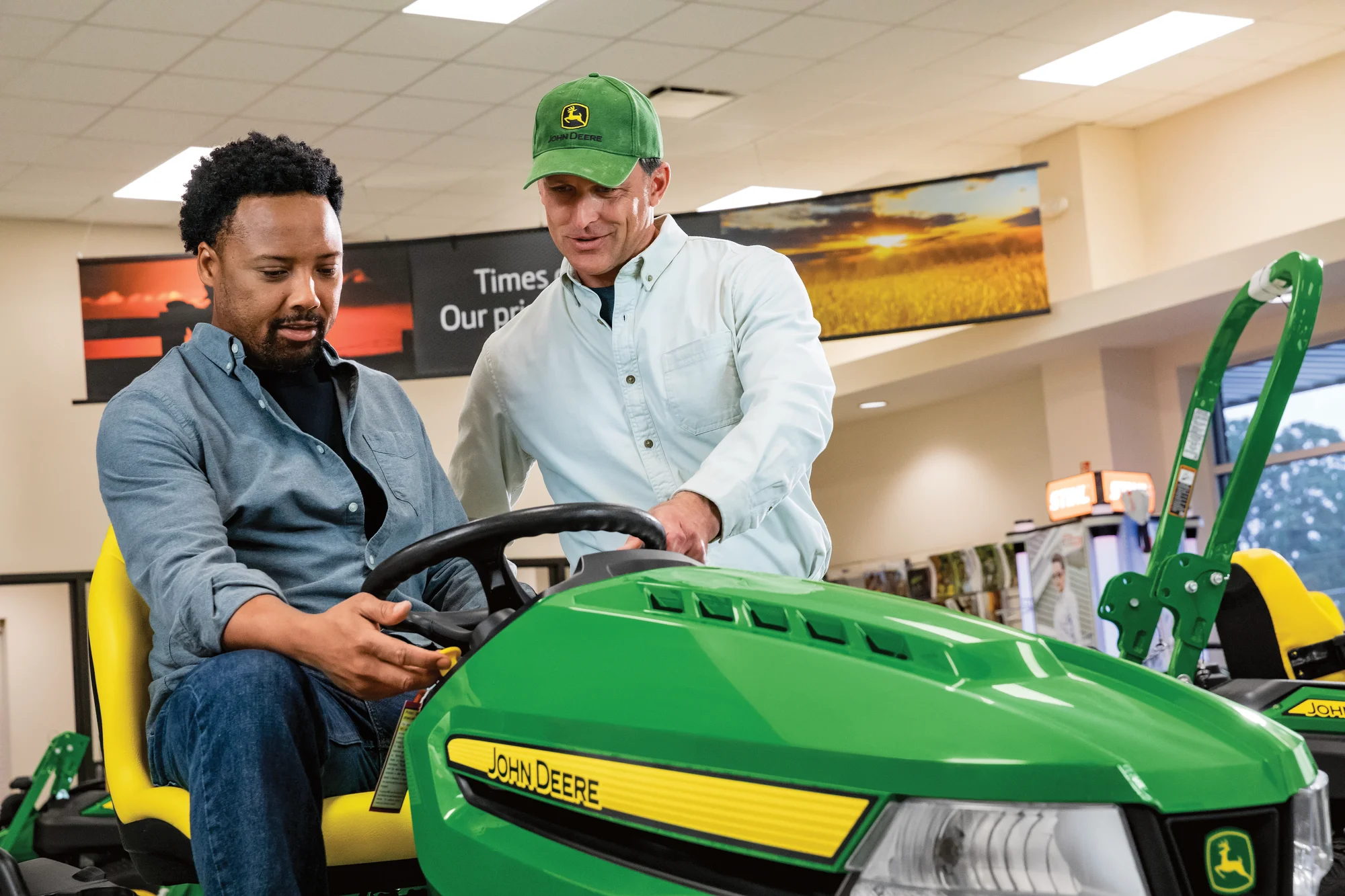 John Deere Select X500 Series Garden Tractor X590 John Deere X500 Select Series Lawn Tractor X590 Salesperson Customer Showroom product image