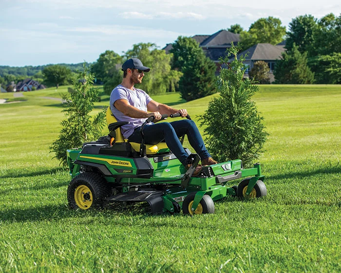 John Deere Ztrak 300 Series Zero Turn Rider Z320R Man On Mower product image