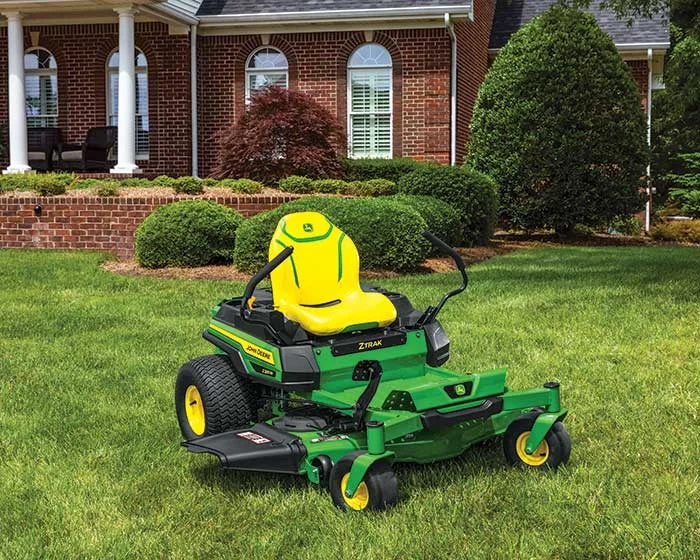 John Deere ZTrak 300 Series Zero Turn Rider Z330M-48 John Deere Ztrak 300 Series Zero Turn Rider Z330M 48 Mower On Lawn product image