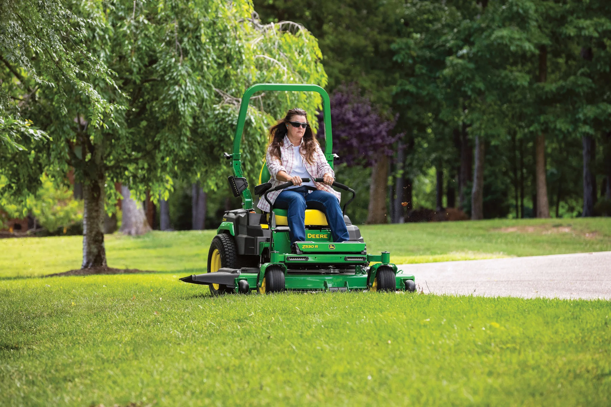 John Deere ZTrak 500 Series Zero Turn Rider Z530R-54 John Deere Ztrak 500 Series Zero Turn Rider Z530R Woman On Mower product image