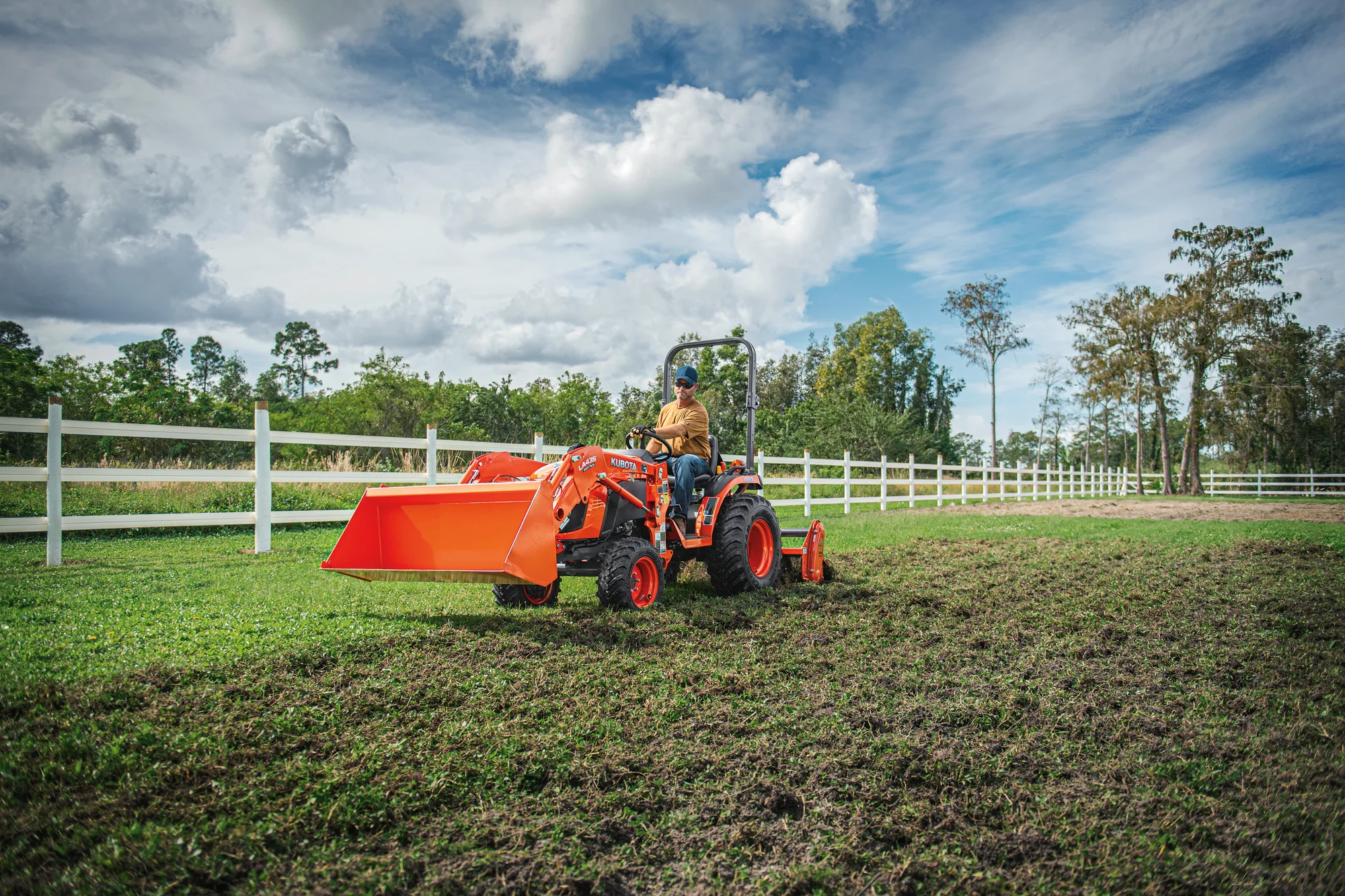 Kubota B01 Series Compact Utility Tractors B2401 Front View Right Bucket Attachment product image