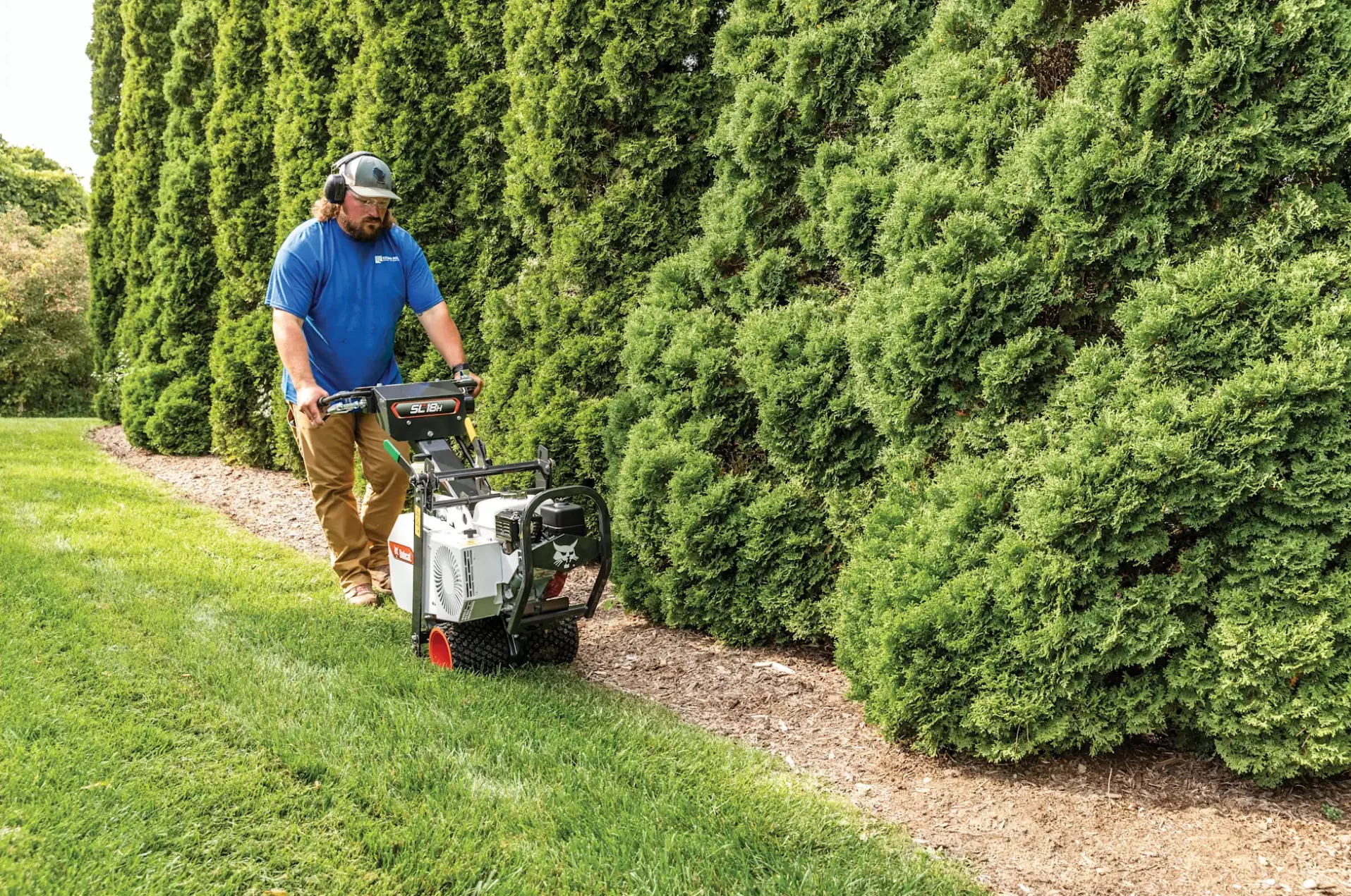 RYAN SC18H Sod Cutter Ryan Sc18H Series Sod Cutter 7885828 Front View Left Cutting Around Tree Line product image