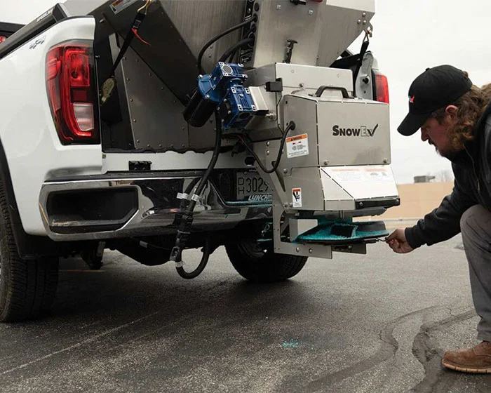 Snowex Renegade 22 Hopper Spreader 86420 Man Loading product image