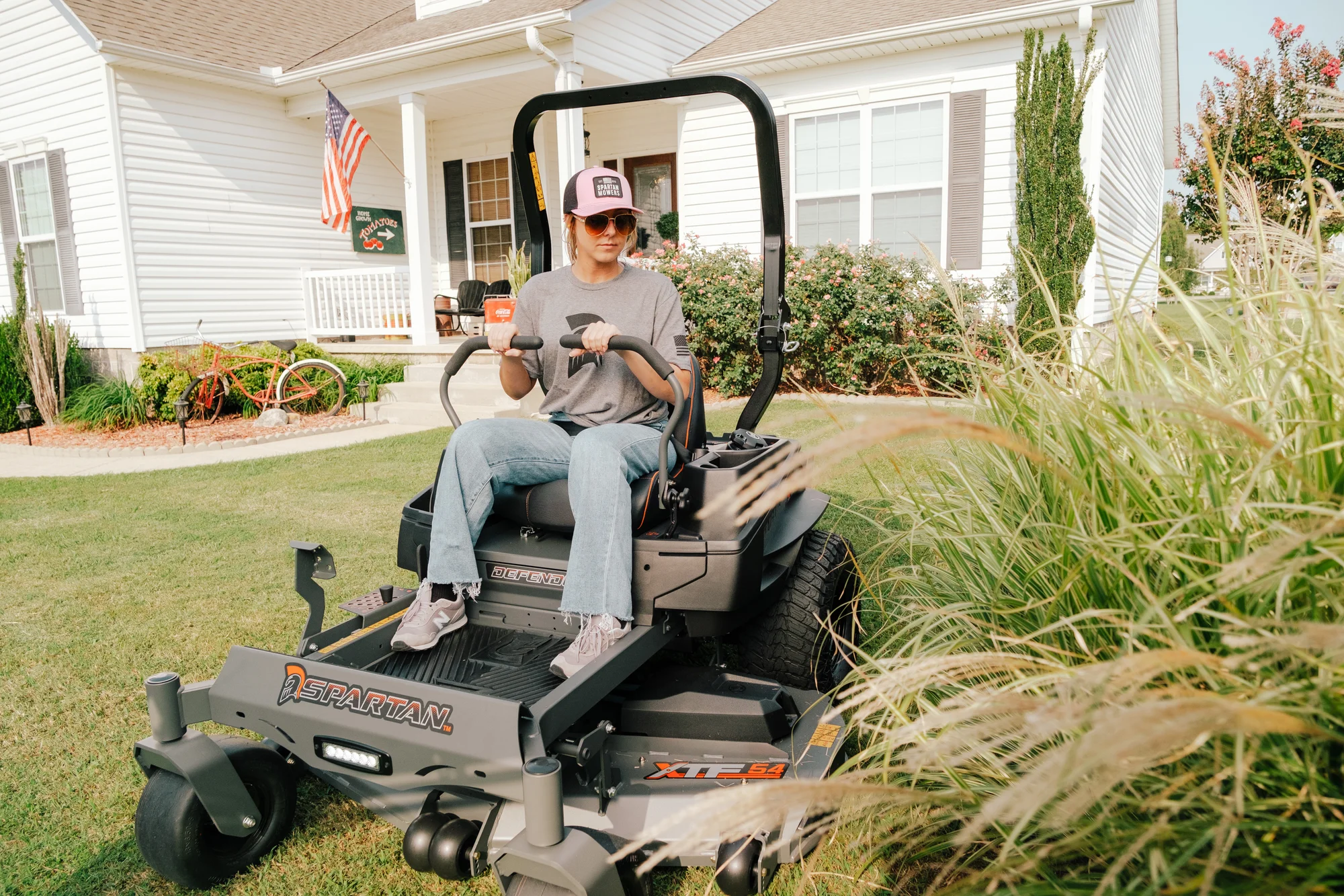 Spartan Defender Zero Turn Rider Szde1K60730Kr Woman On Mower Tall Grass product image