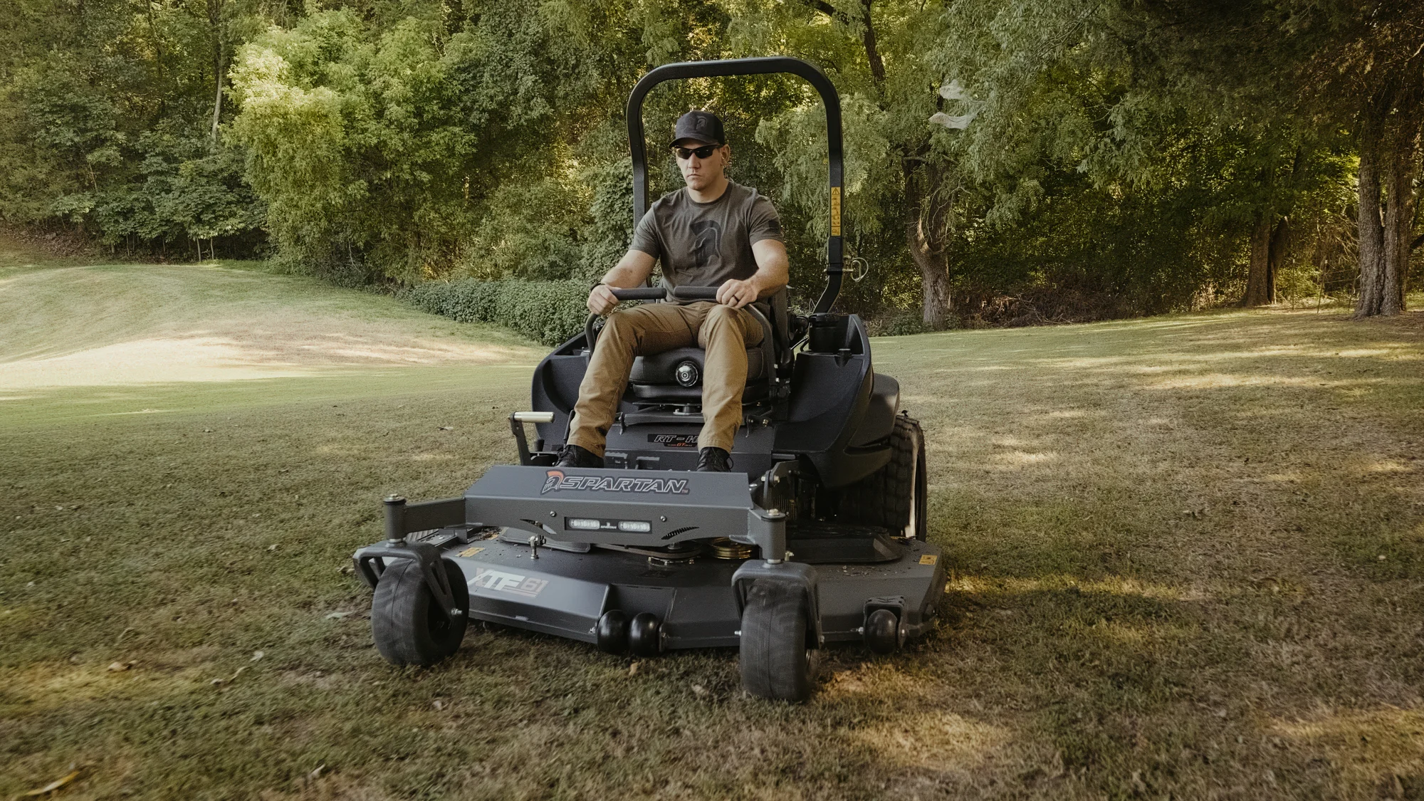Spartan Rt Hd Zero Turn Rider Rsrhd161999Kx Font View Right Man Cutting Grass product image