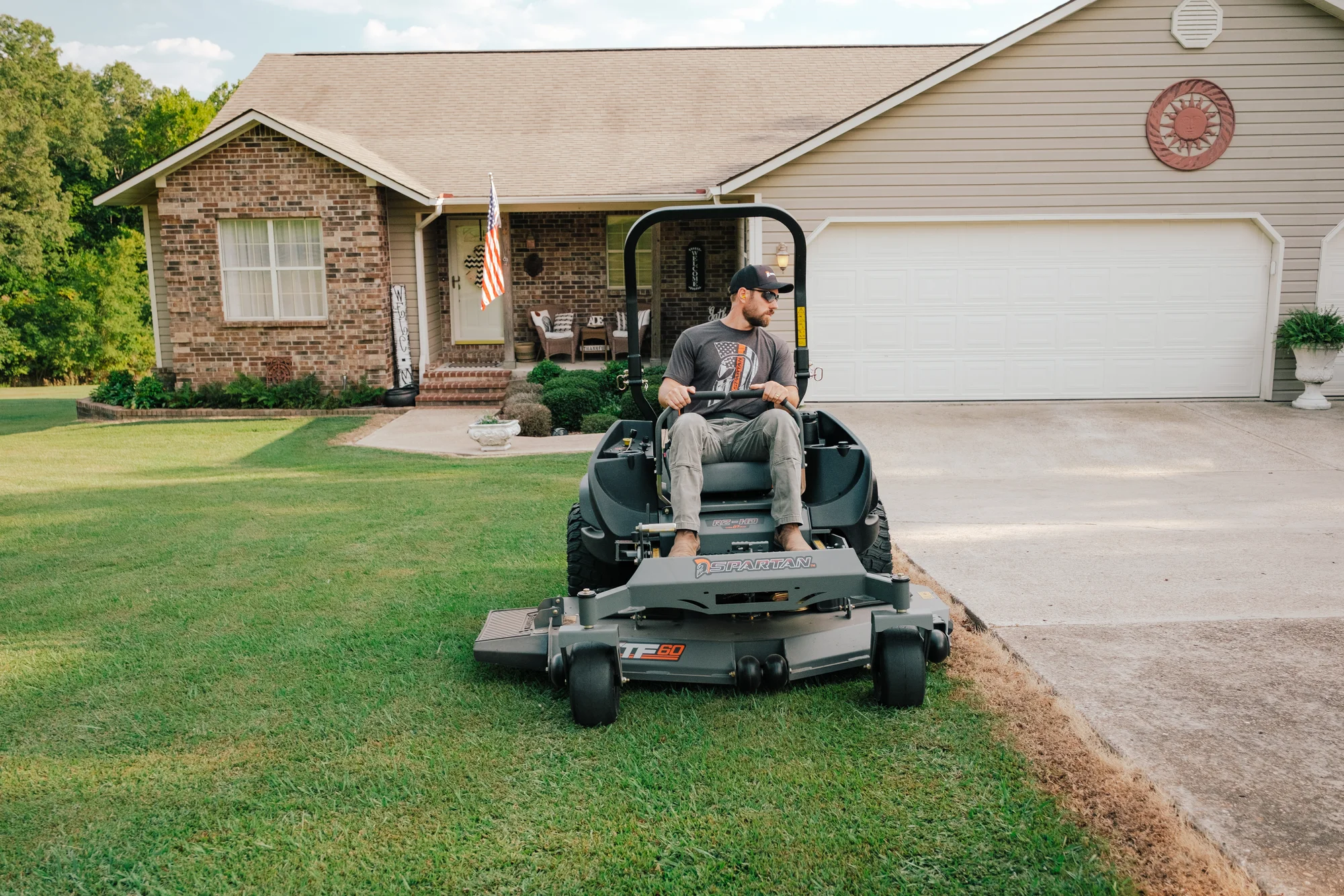 Spartan RZ-HD Zero Turn Rider RSZL1148FR730 Spartan Rz Hd Zero Turn Rider Rszl1148Fr730 Man Posing Mower product image