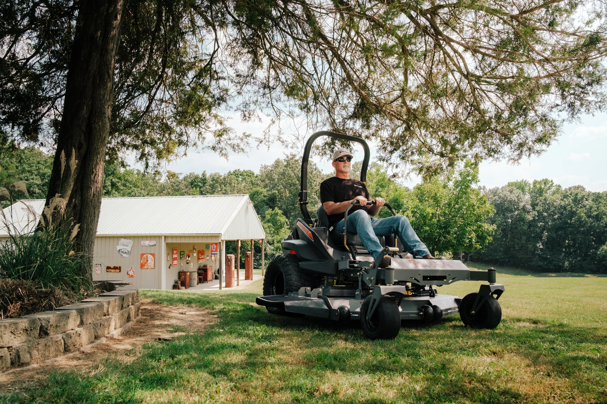 Spartan Rz Xd Zero Turn Rider Rszl2148Fx730 Man Posing Mower Distant product image