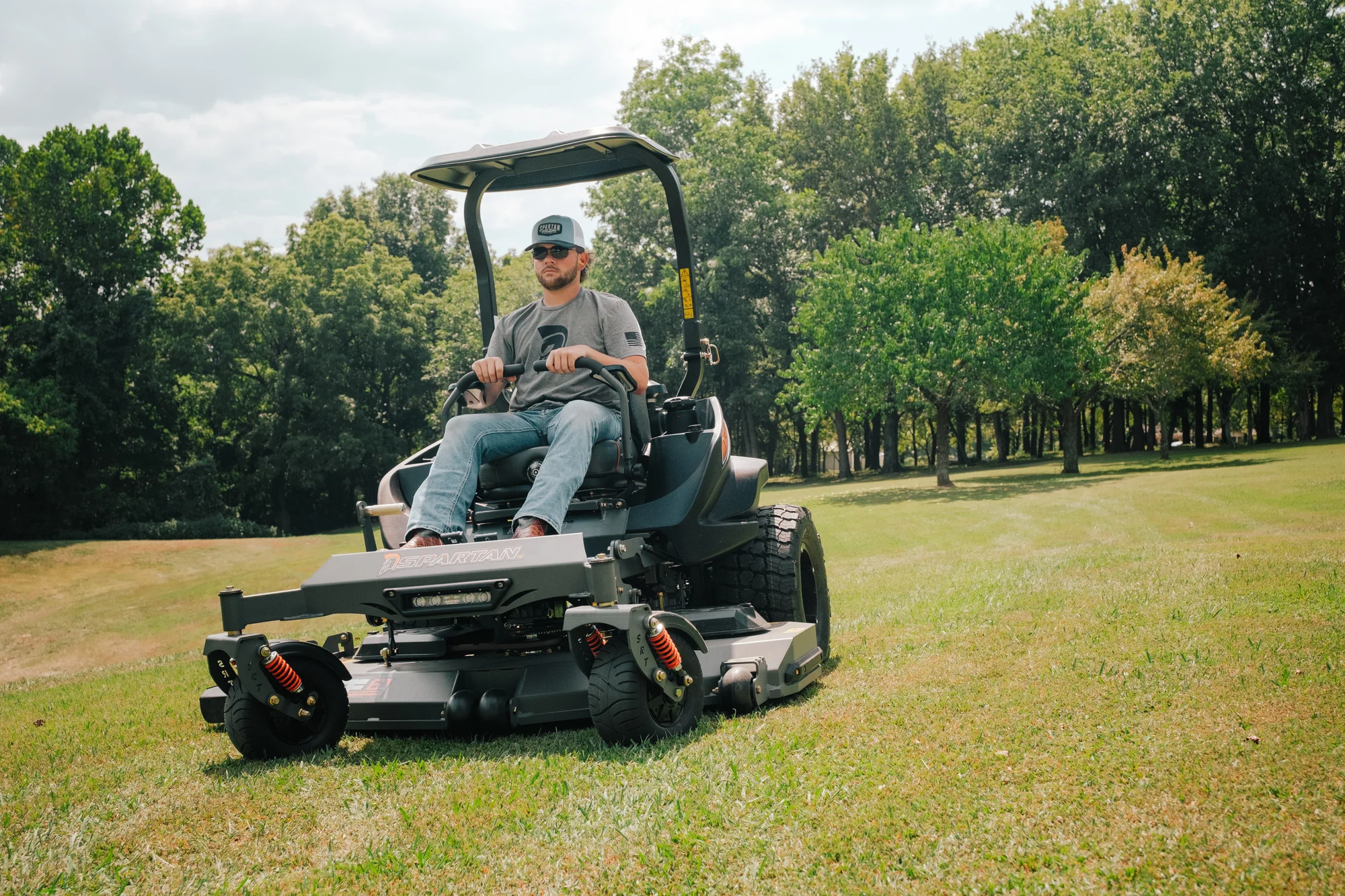 Spartan SRT-XD Zero Turn Rider RSSXD172999KE Spartan Srt Xd Zero Turn Rider Rssxd172999Ke Man On Mower Front View product image