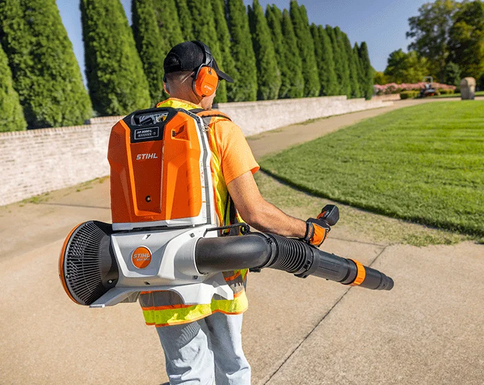 Stihl Backpack Blower Bga 300 Man Clearing Sidewalk Back View product image