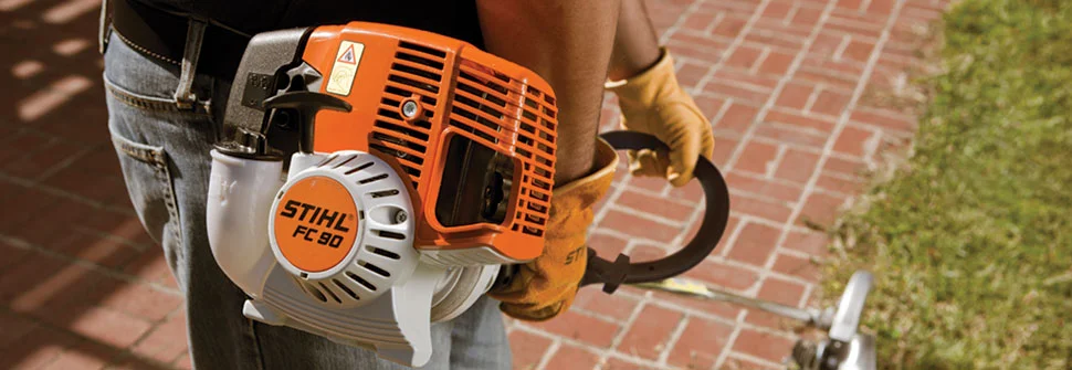 Stihl Fc90 Edger Man Removing Grass From Patio product image