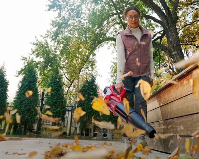 Toro 60V MAX Leaf Blower 51826 Toro 60V Max 750 Series Leaf Blower 51826 Woman Blowing Leaves product image