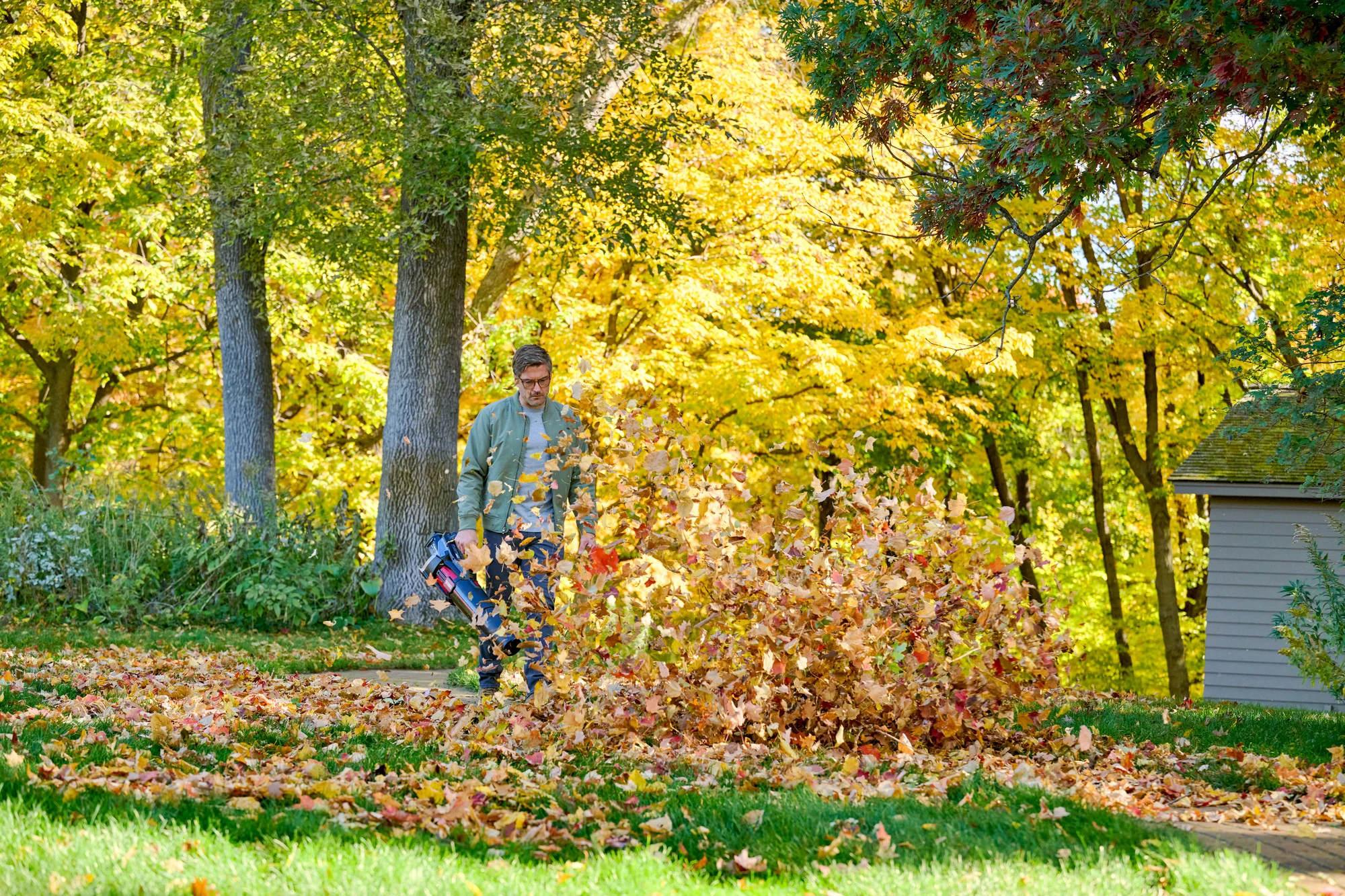 Toro 60V Max 900 Series Leaf Blower 51827 Blowing Large Leaf Pile product image